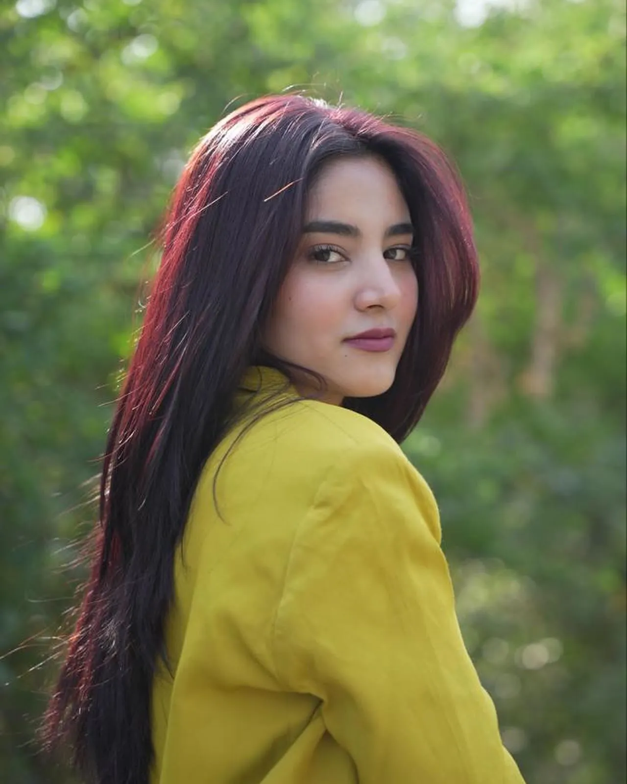 Sleek Maroon Layers showing maroon hair colour