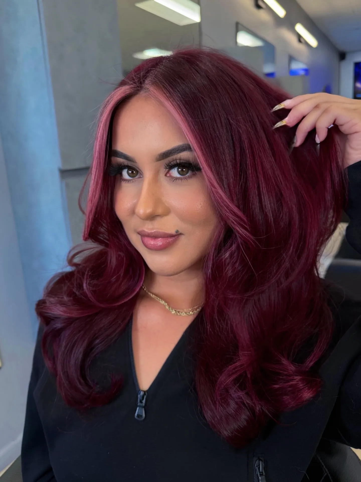 Full Maroon Blowout showing maroon hair colour