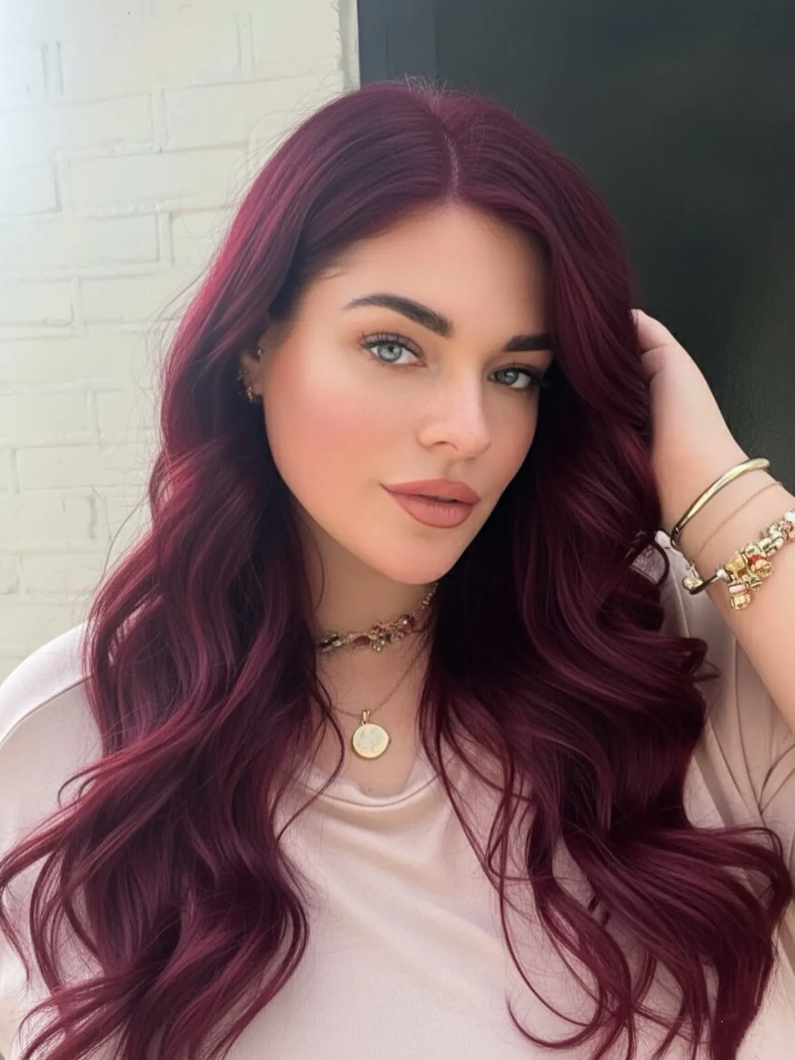 Long Maroon Waves showing maroon hair colour