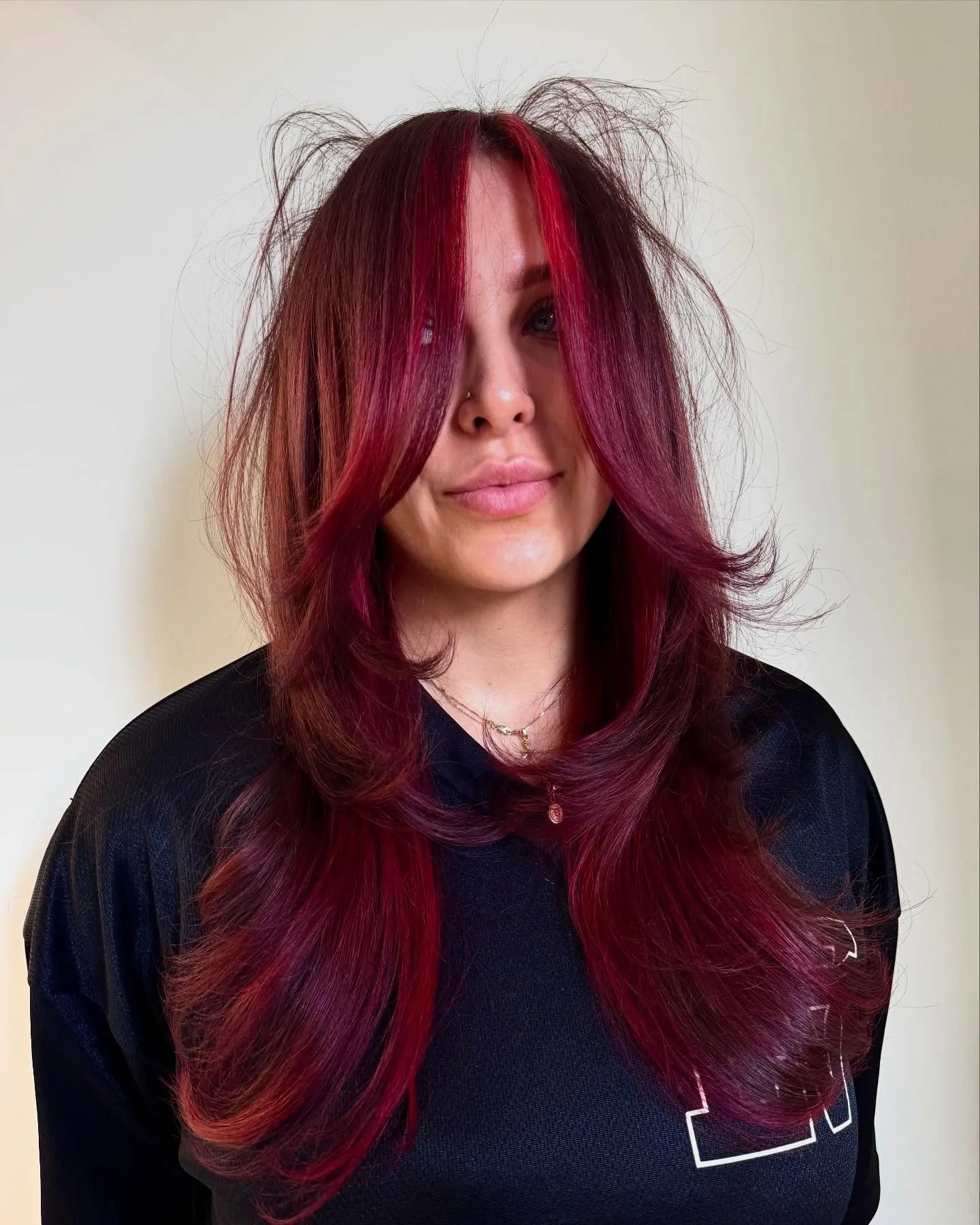 Layered Maroon Shag showing maroon hair colour
