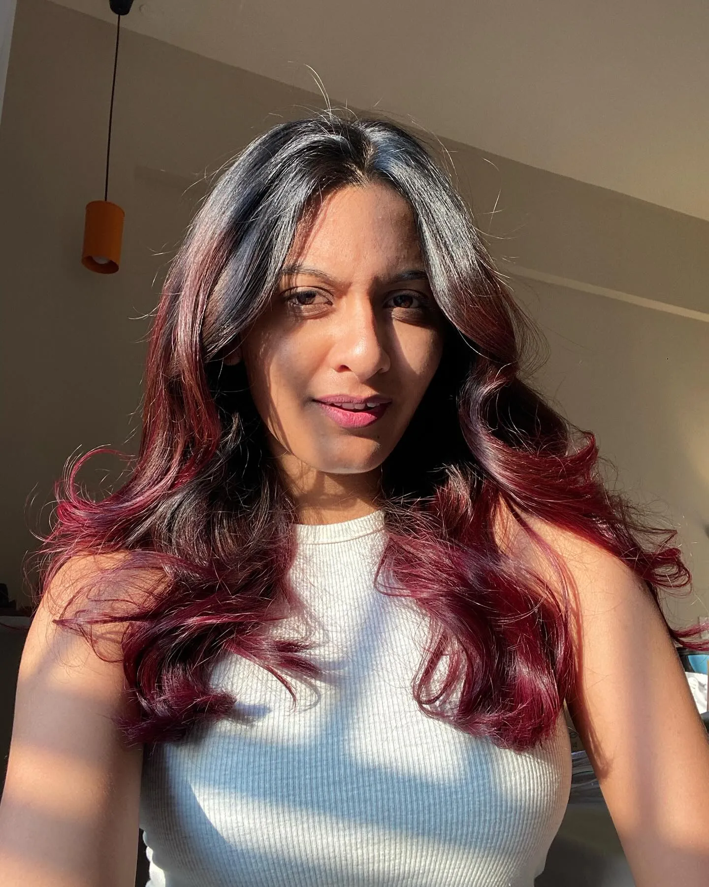 Maroon Face-Framing Waves showing maroon hair colour