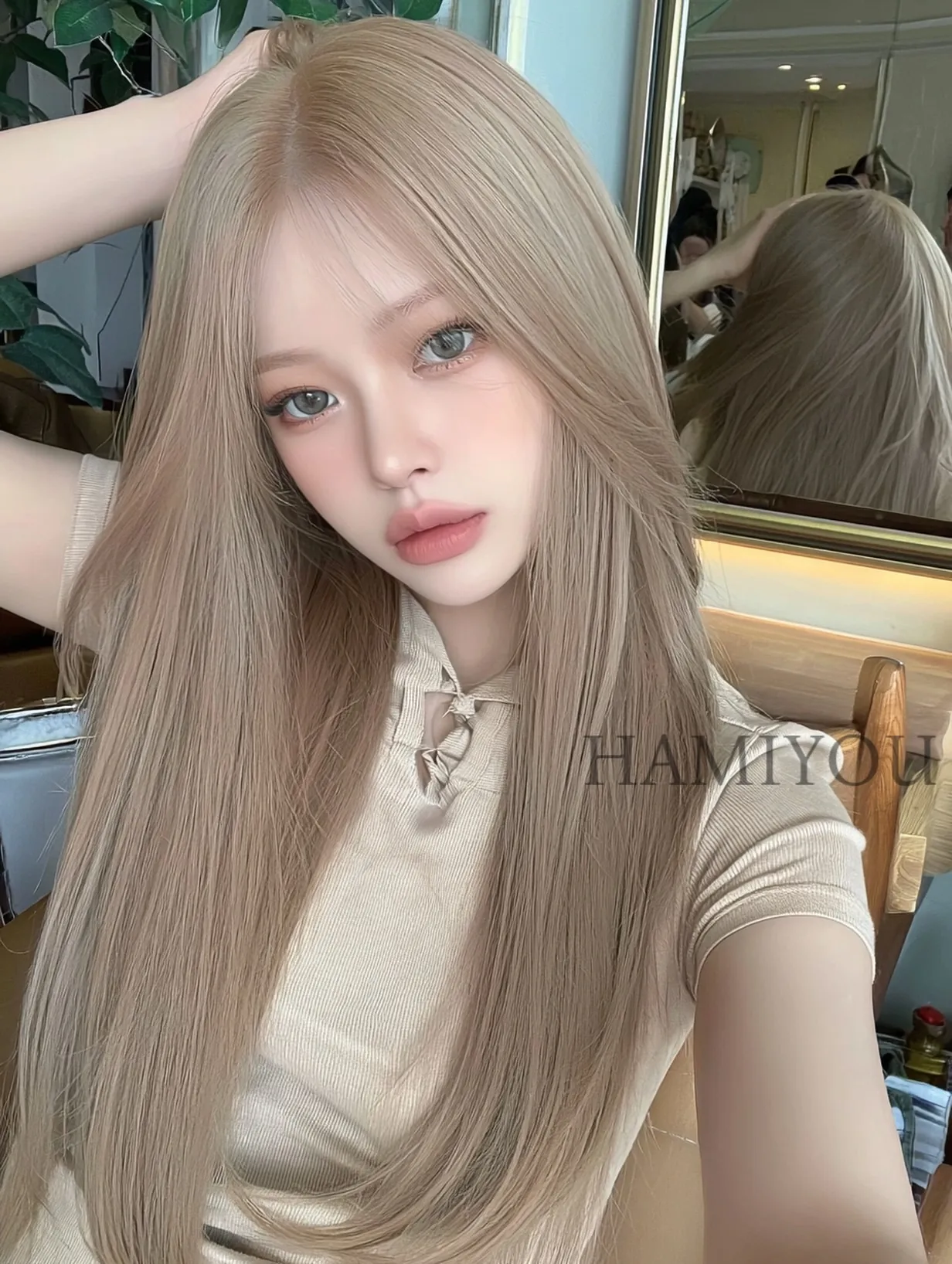Extra-long straight blonde hair with fine face-framing layers