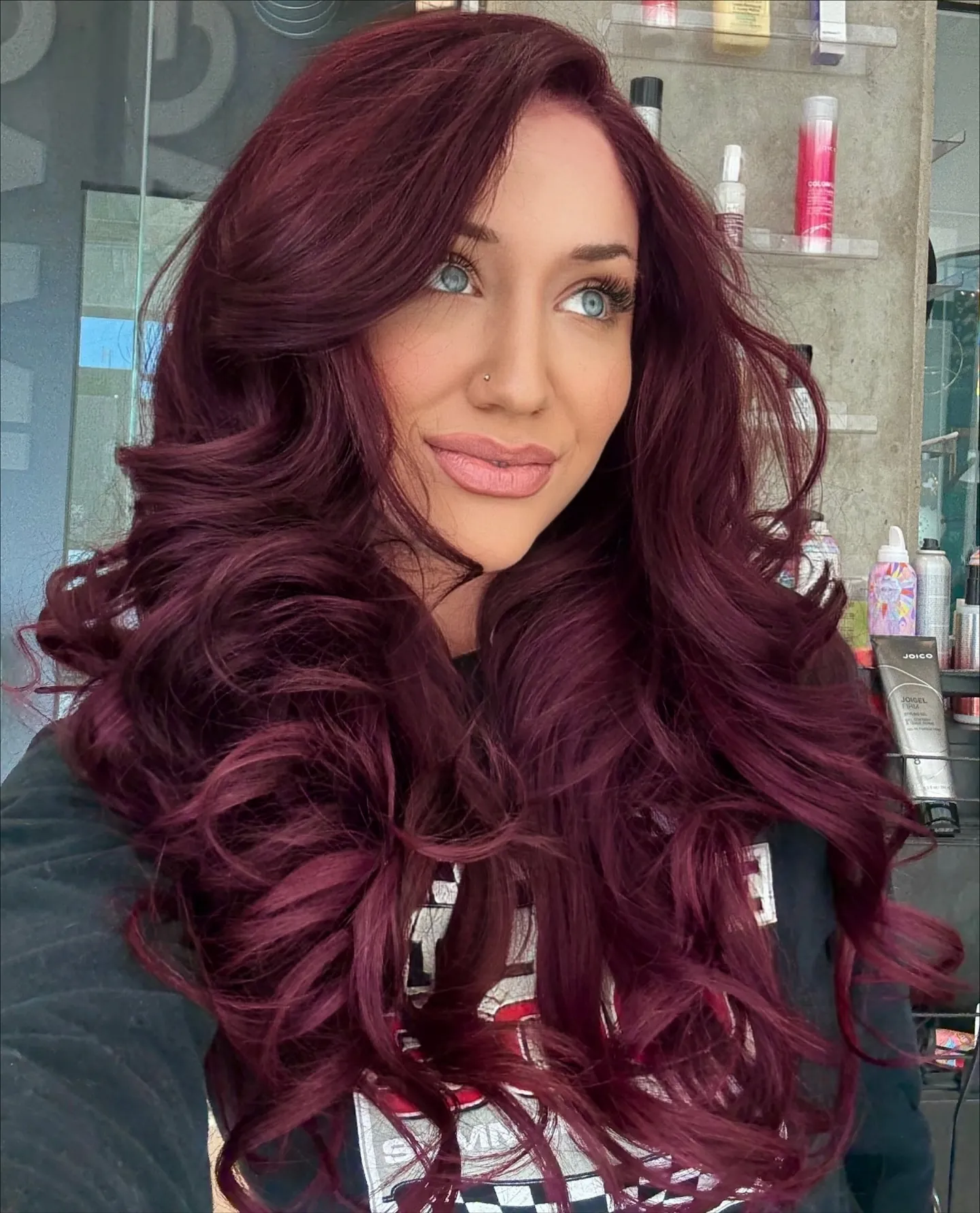 plum hair with voluminous long waves