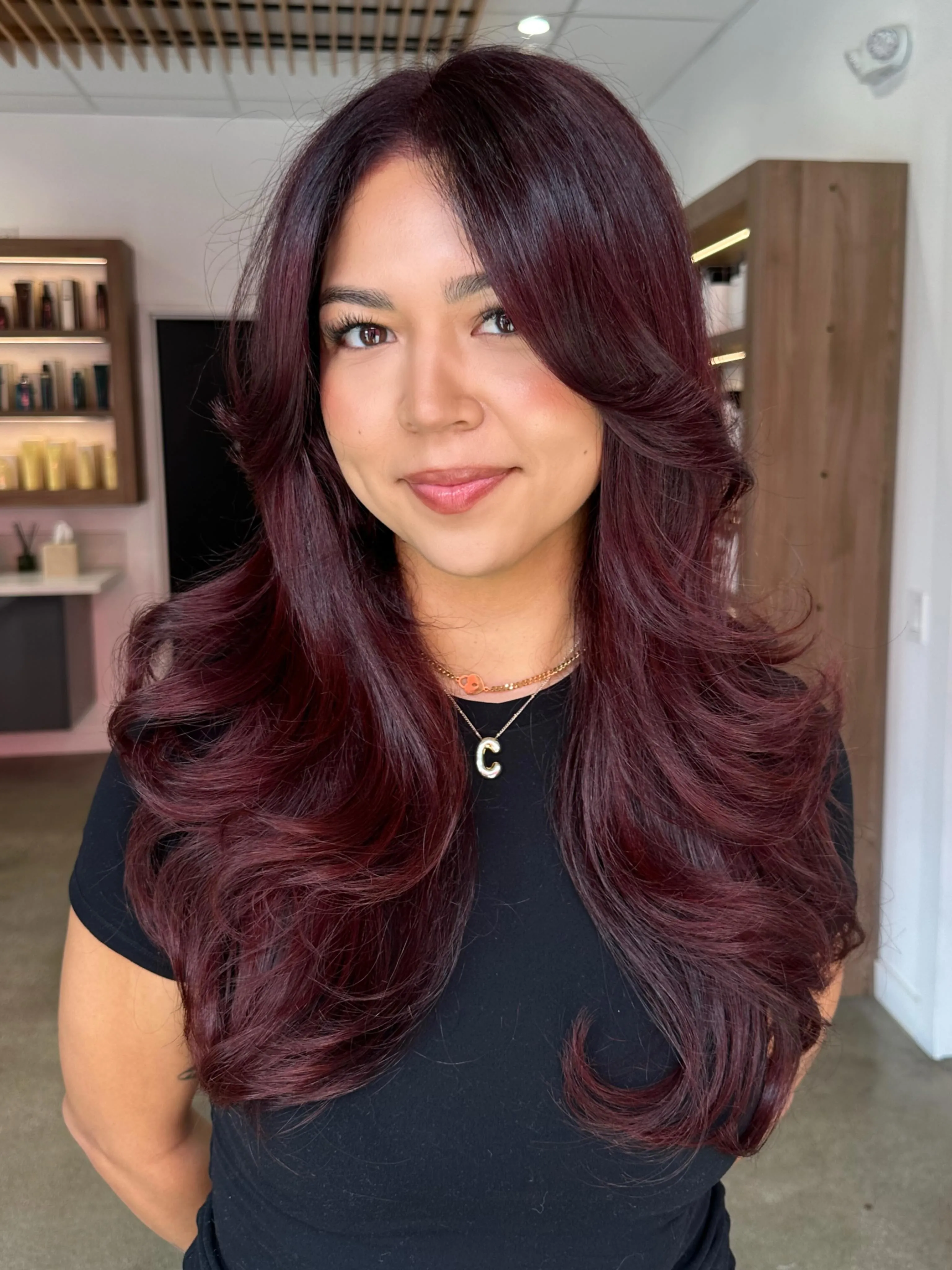 plum hair with layered curtain waves