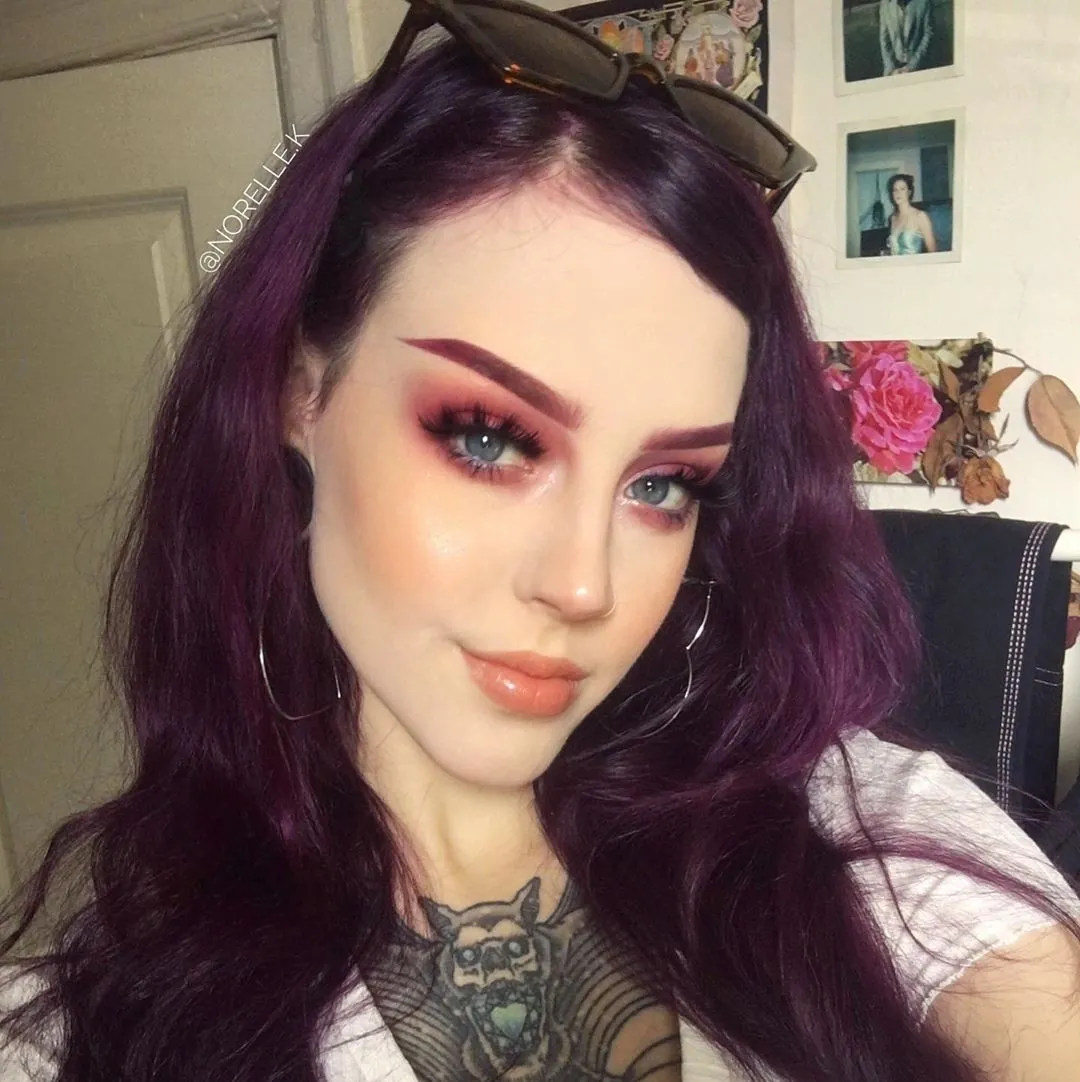 plum hair with loose center waves