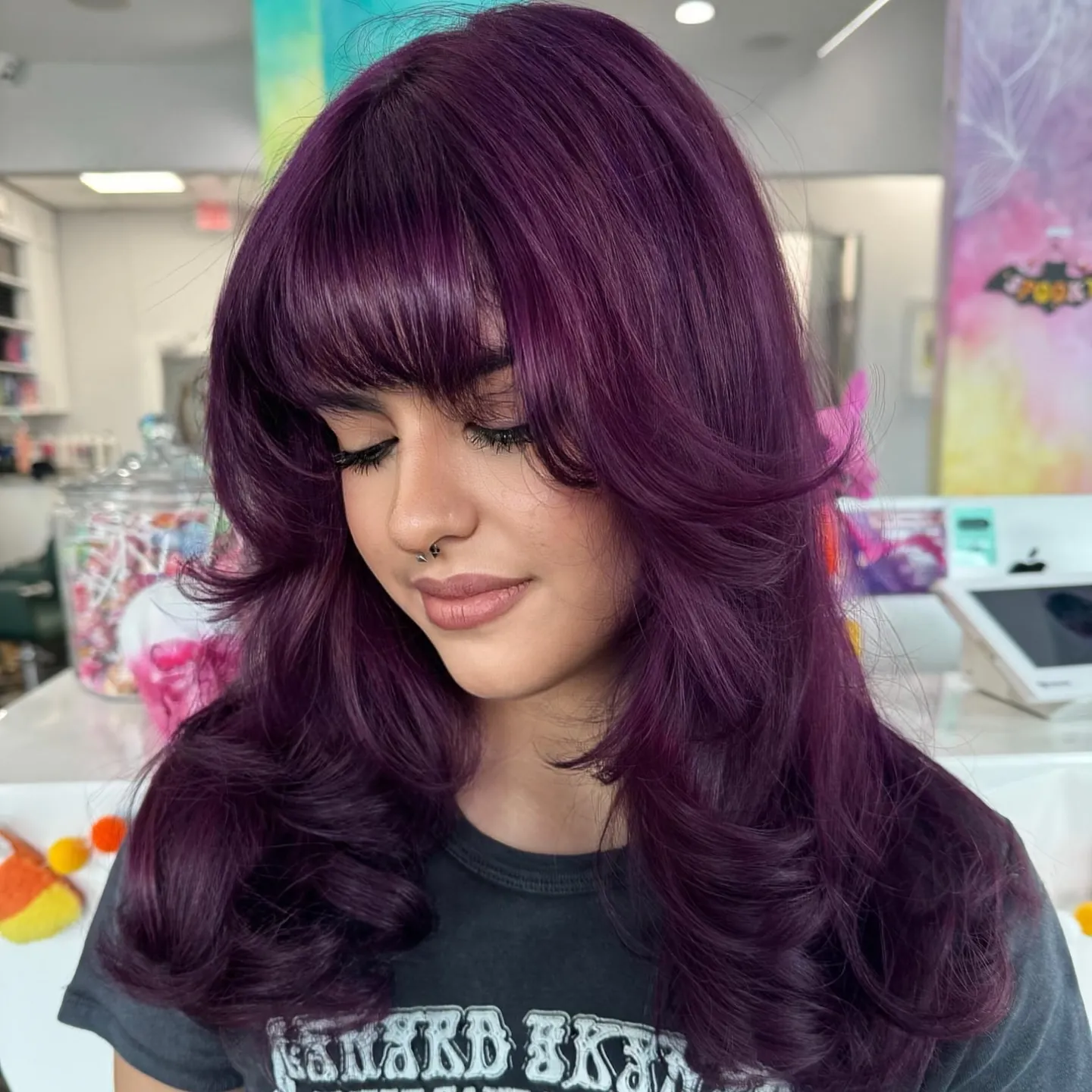 plum hair with full fringe waves