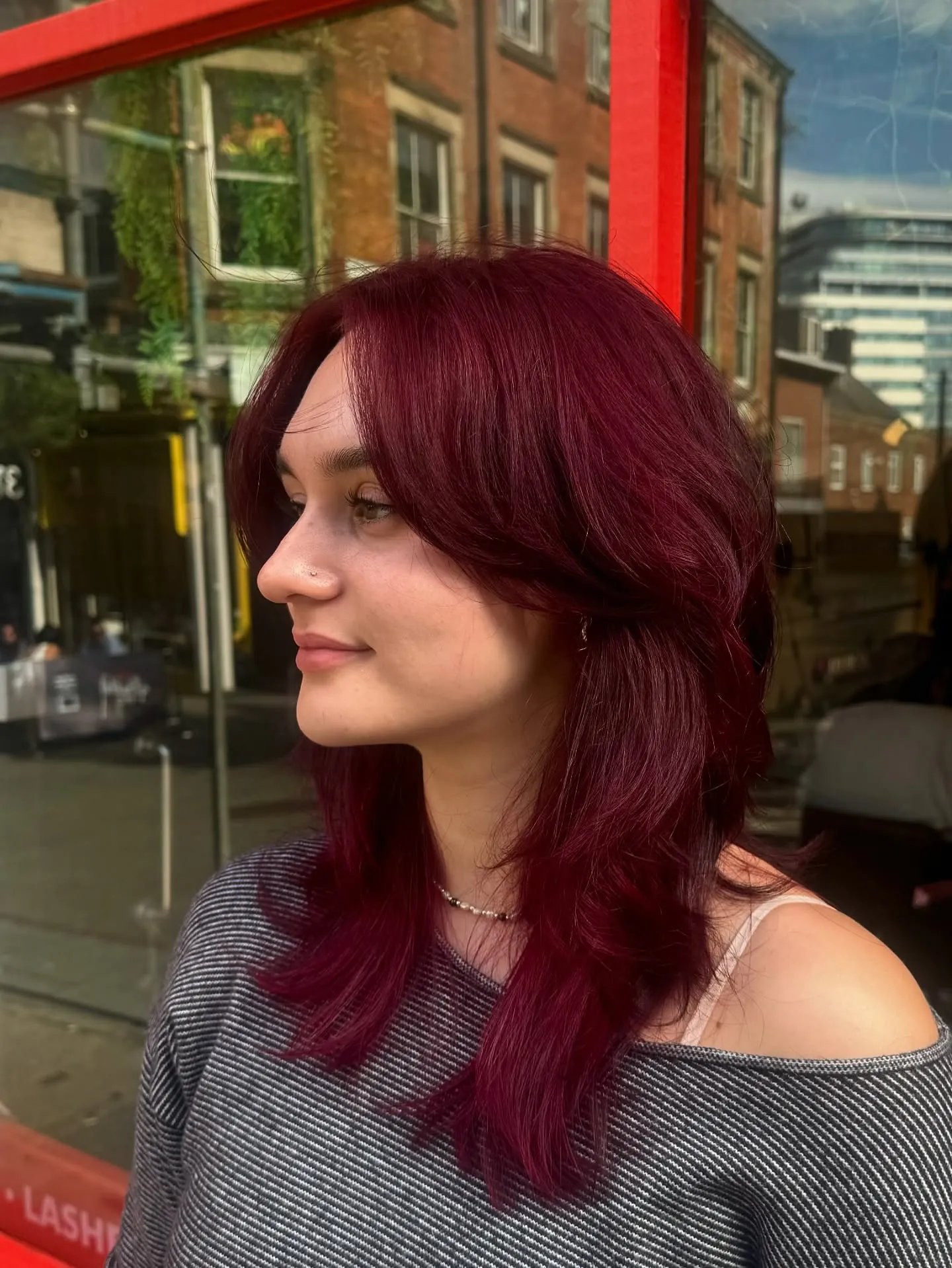 plum hair with straight shoulder cut