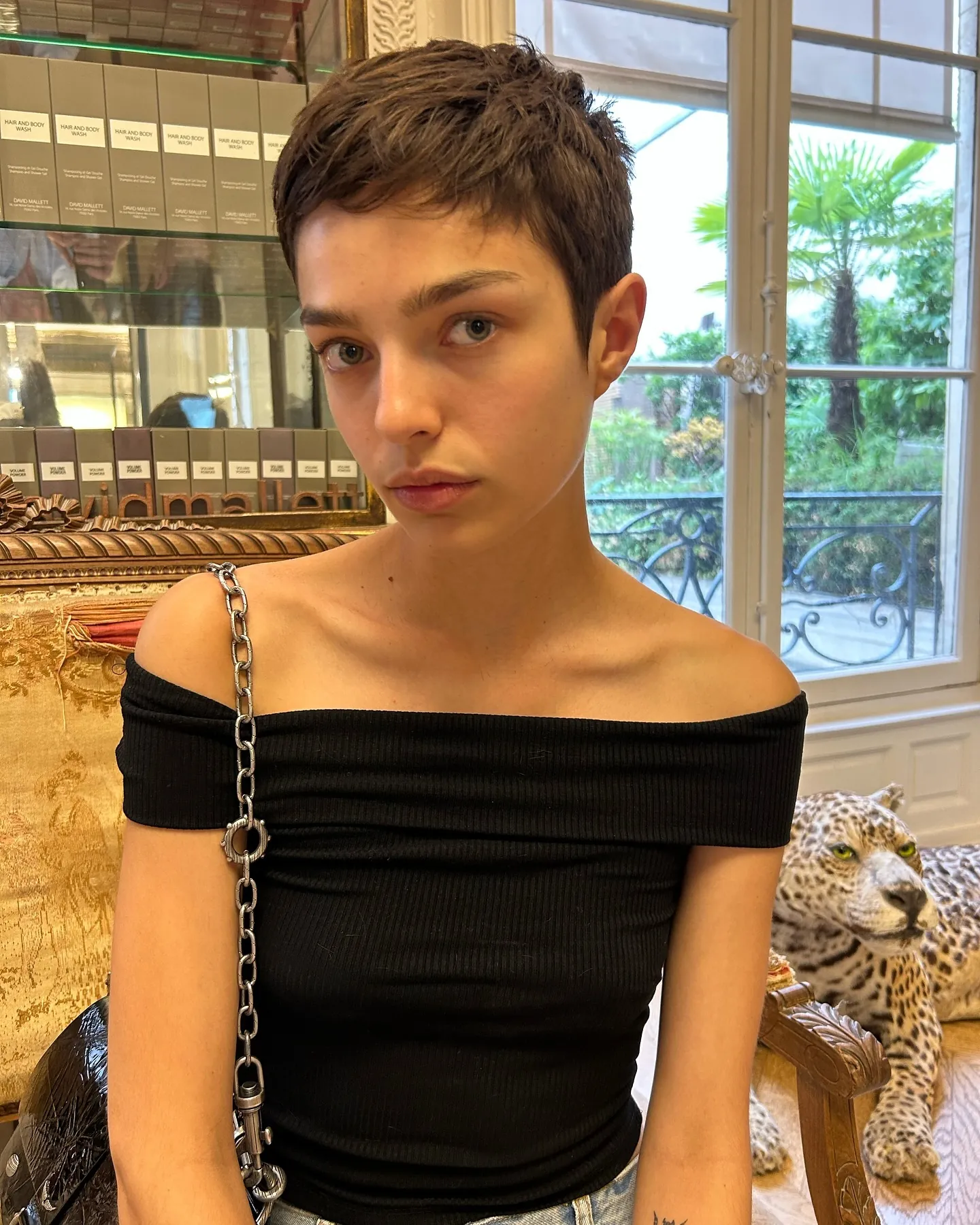 Short textured pixie with a micro fringe and closely tapered sides