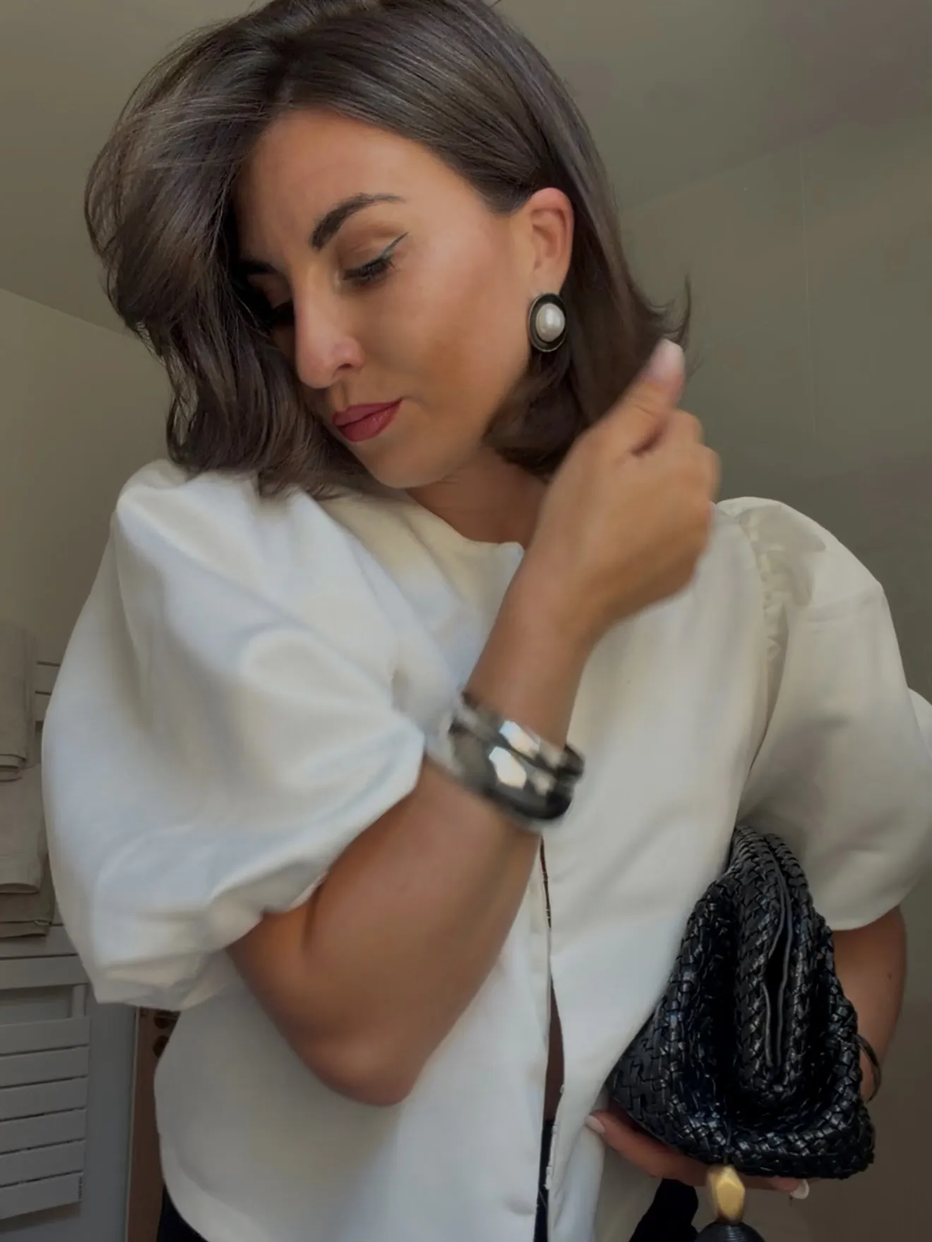 Dark Prada bob with deep side part