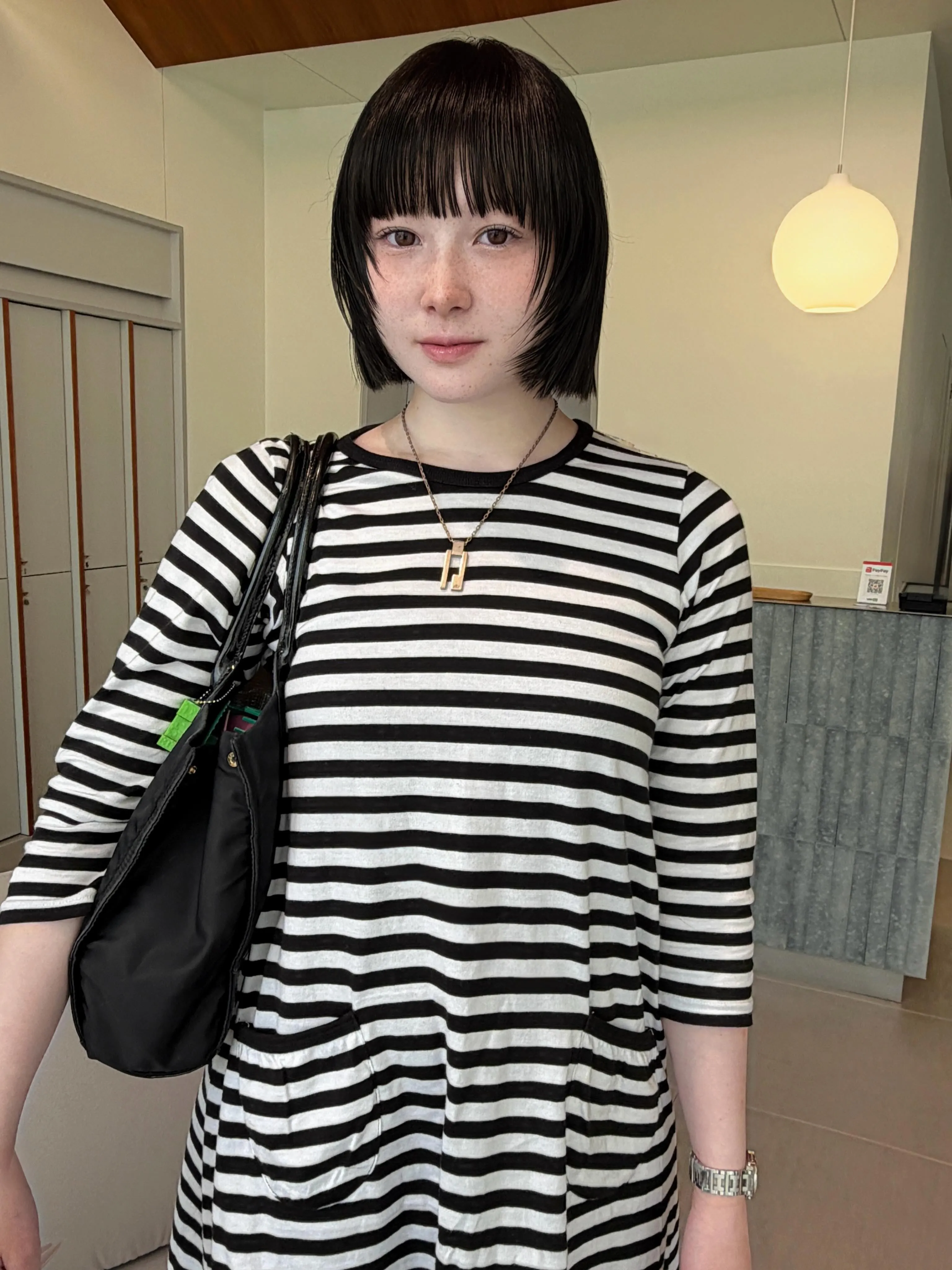 Dark Prada bob with micro fringe and short sides