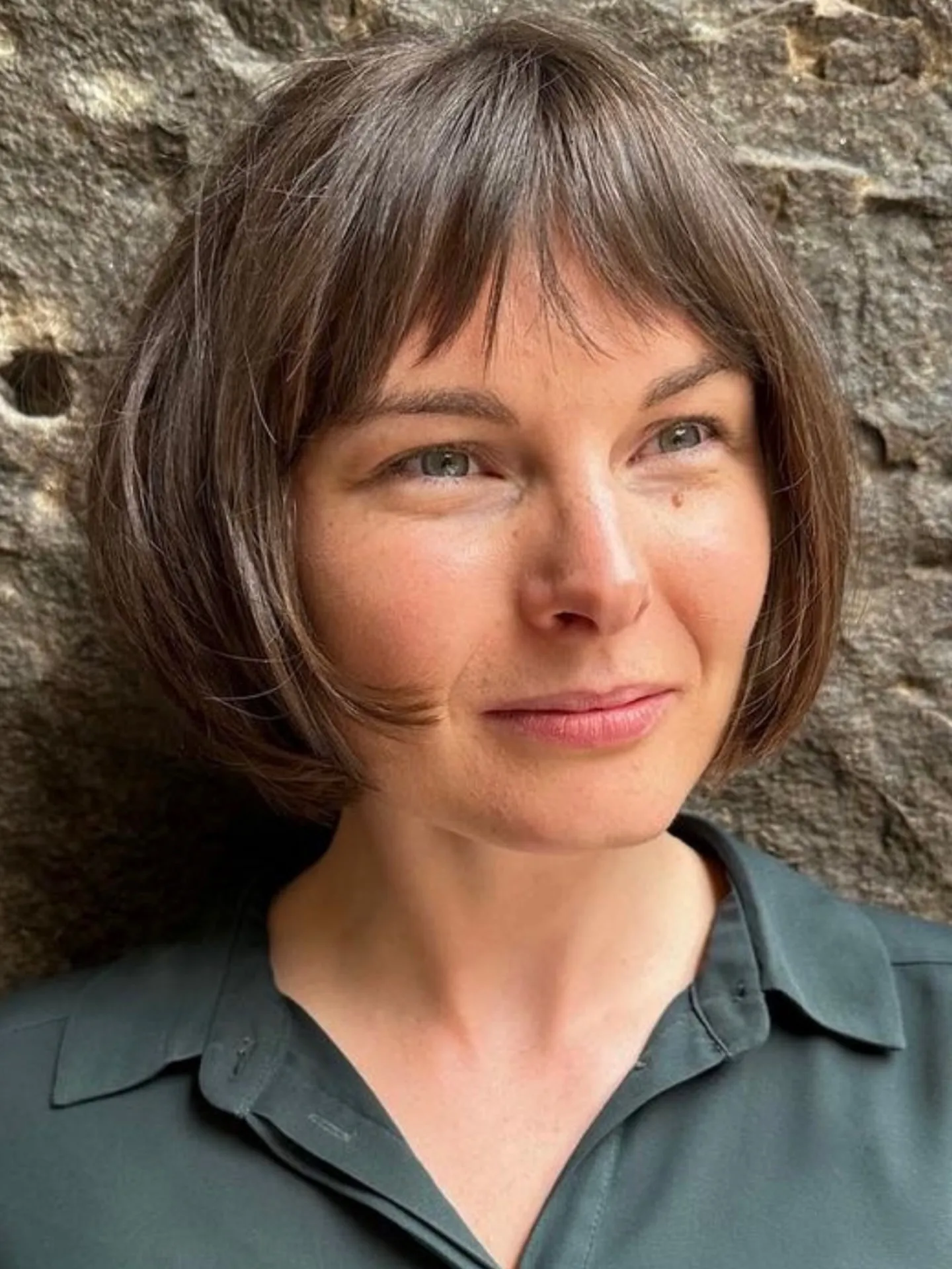 Brown Prada bob with light fringe and soft texture