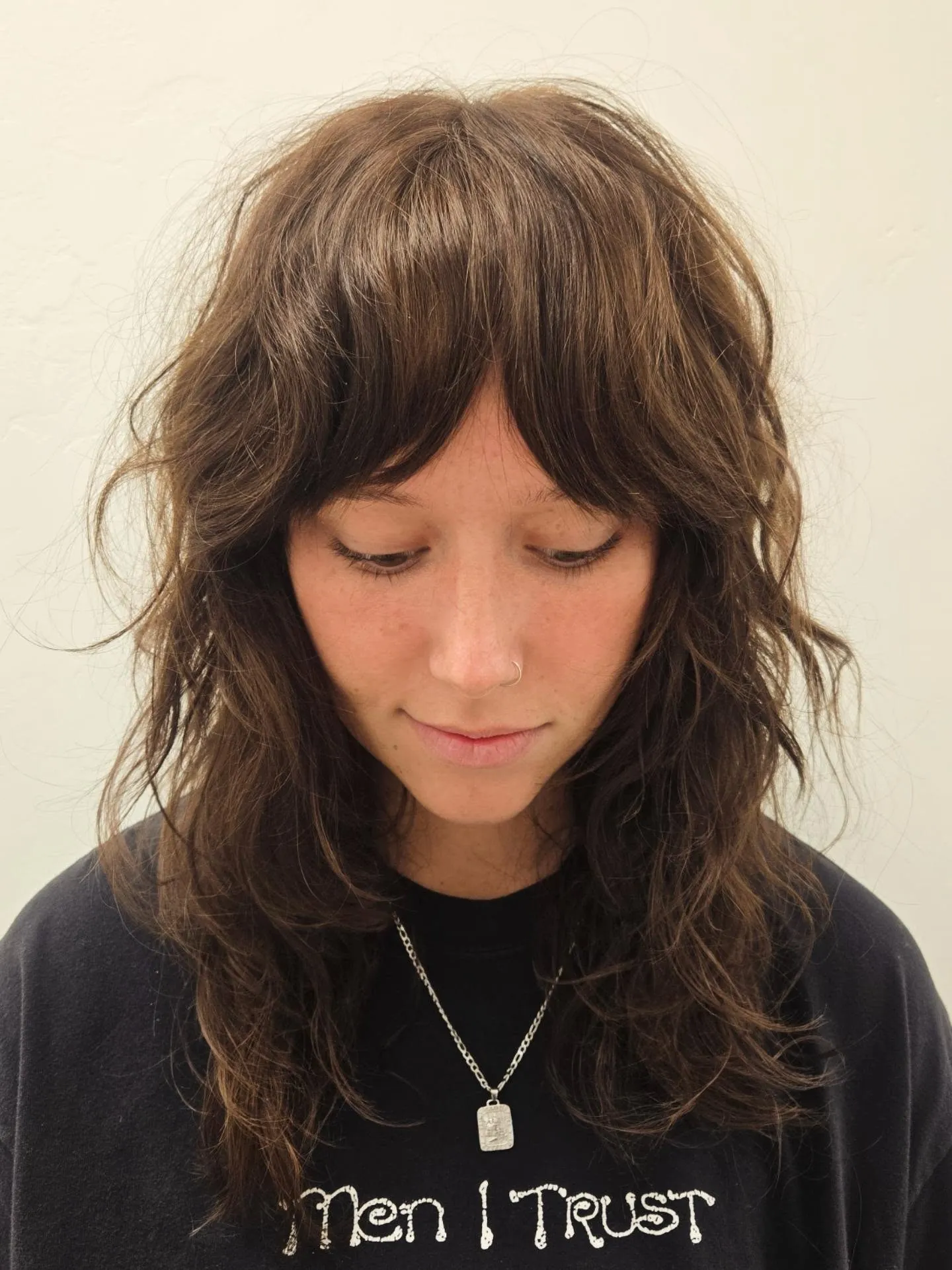 Dark Curly Shag with 1990s-inspired layers