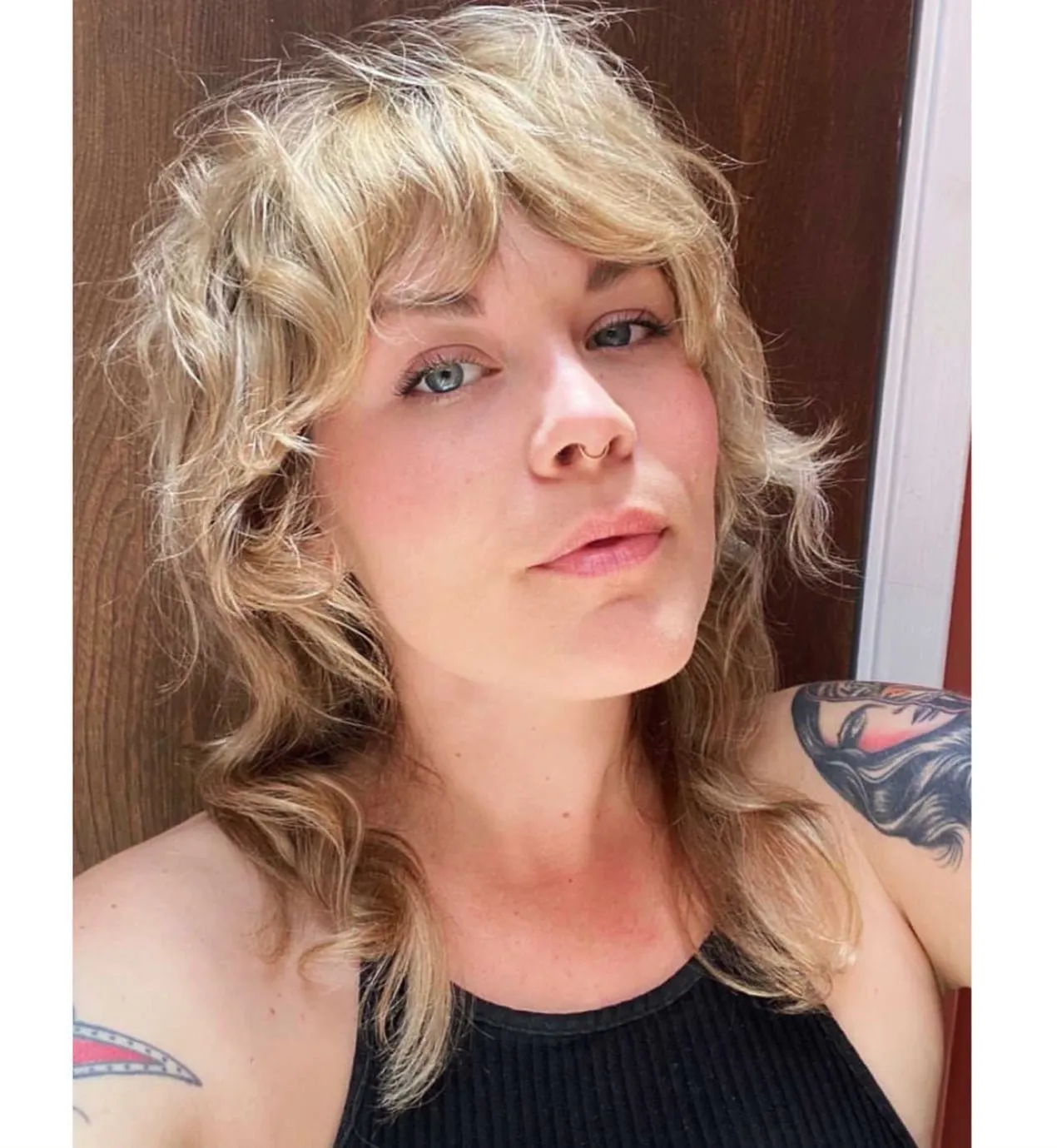 Curly Shag With Bangs with 1970s-inspired layering
