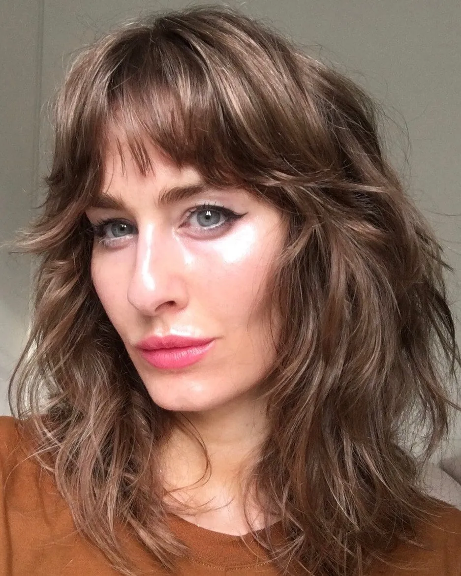 Tousled Brunette Shag with 1970s-inspired layering