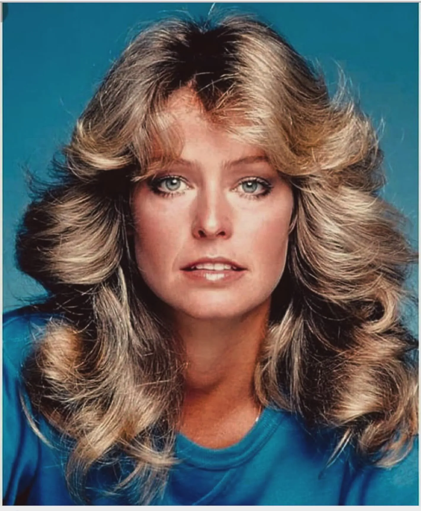 Layered Feathered Curls with 1970s-inspired layering