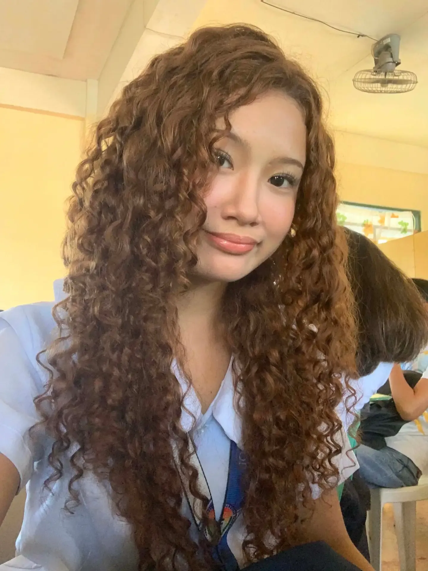 Long defined curls with soft face-framing pieces