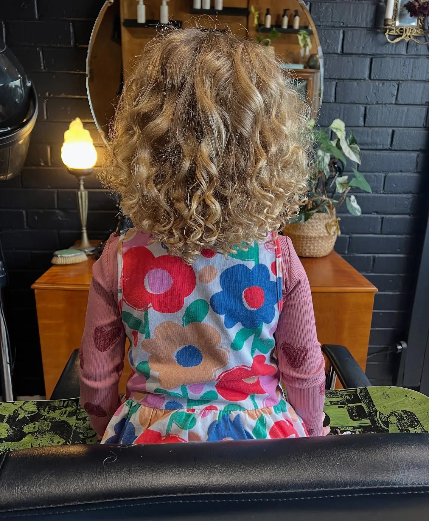 Rounded short curly bob viewed from the back