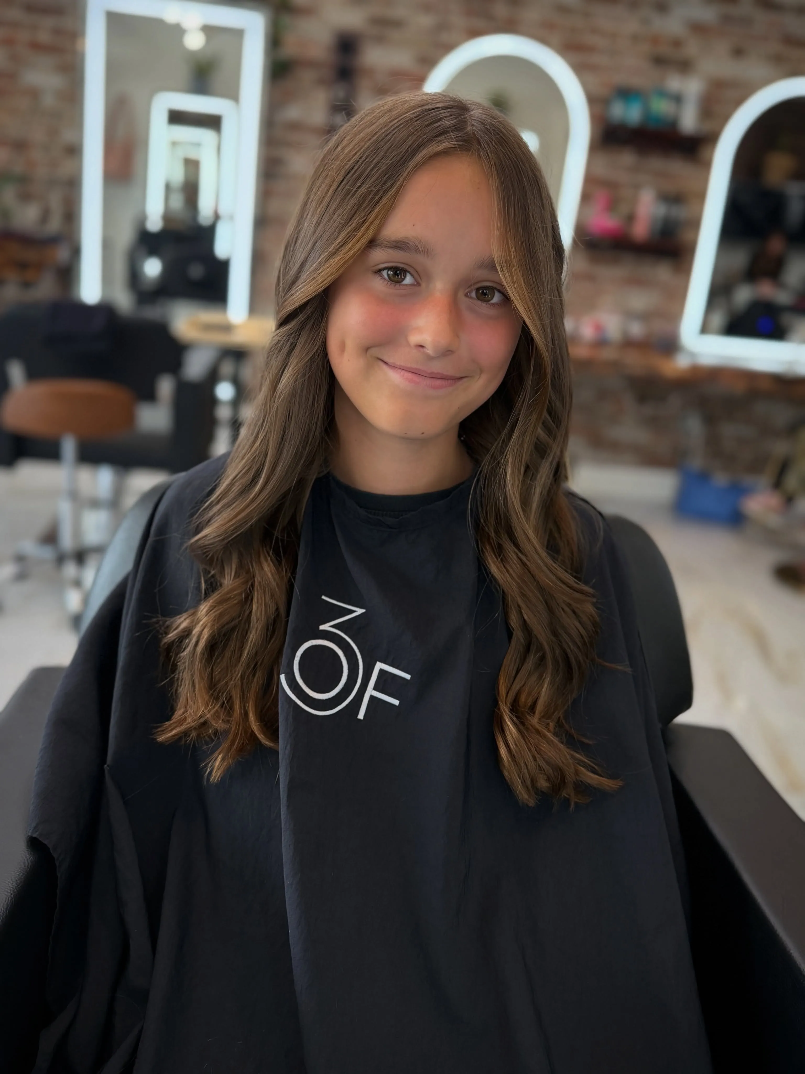 Long soft brunette waves with loose bends