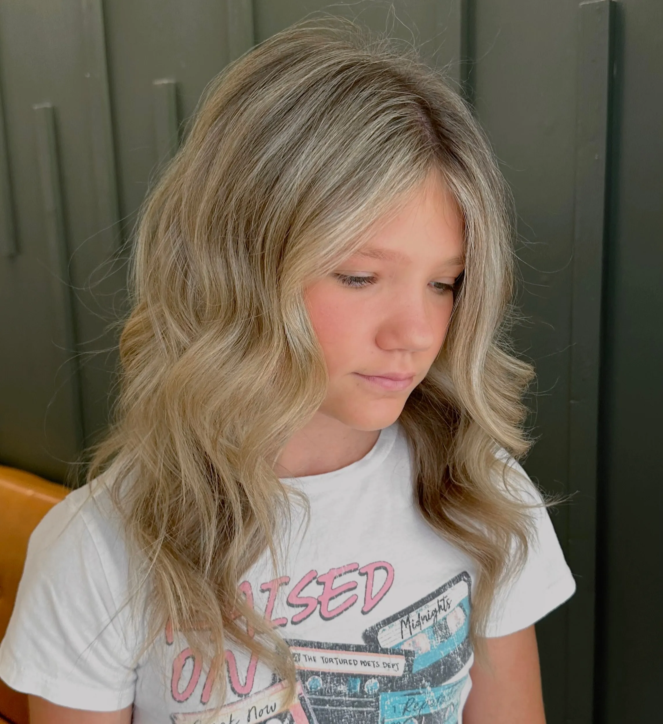 Soft blonde waves with side-swept front pieces