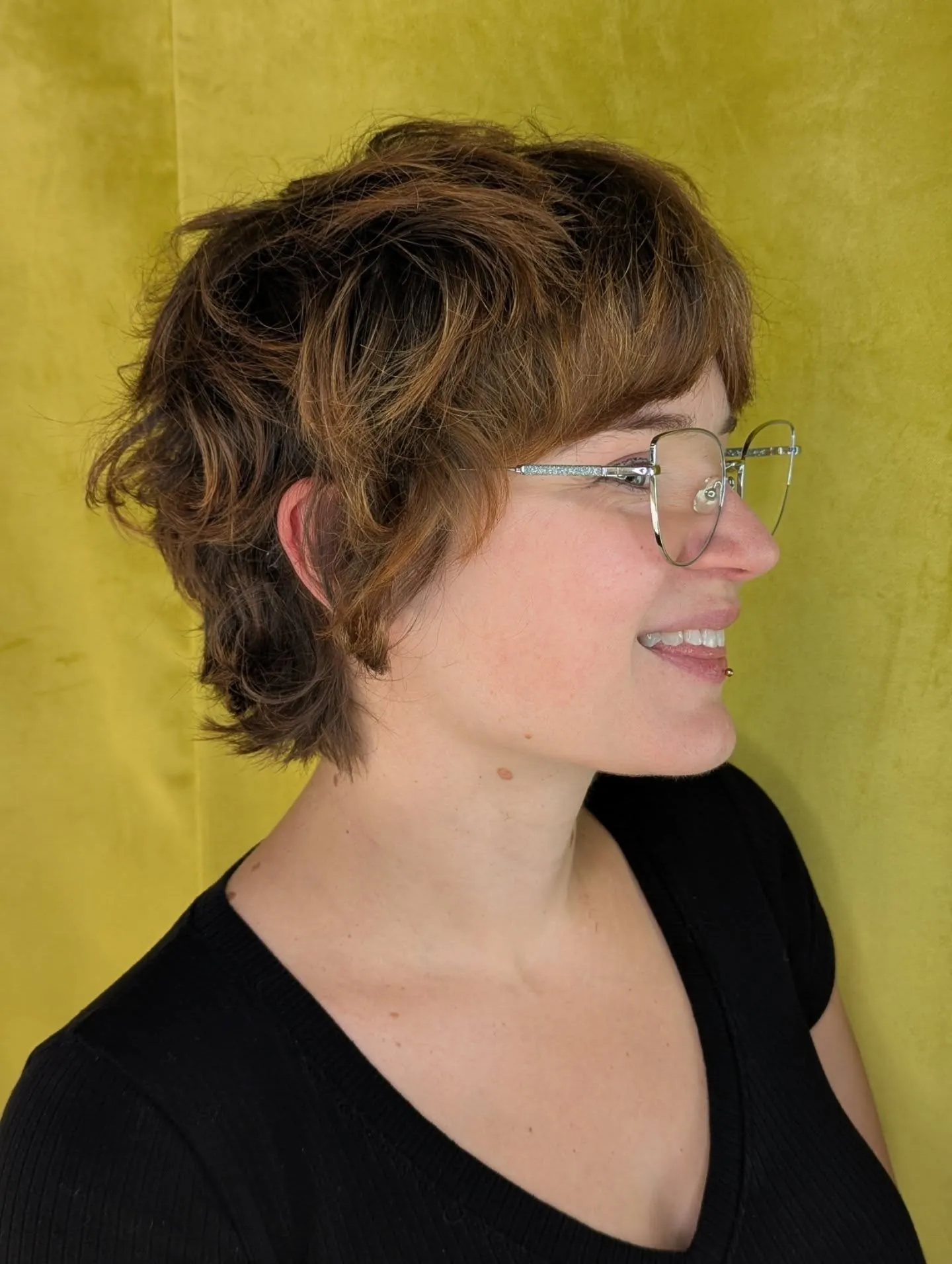 Wavy shaggy pixie mullet with longer back layers