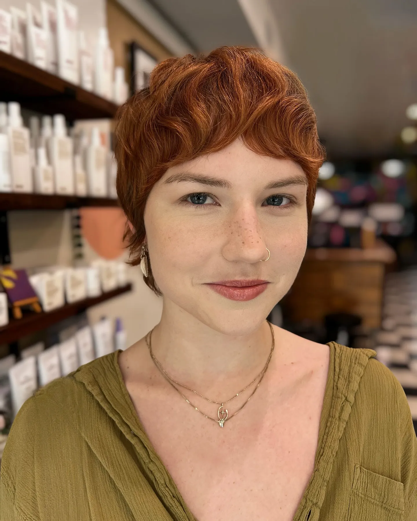 Smooth copper pixie with soft side-swept fringe