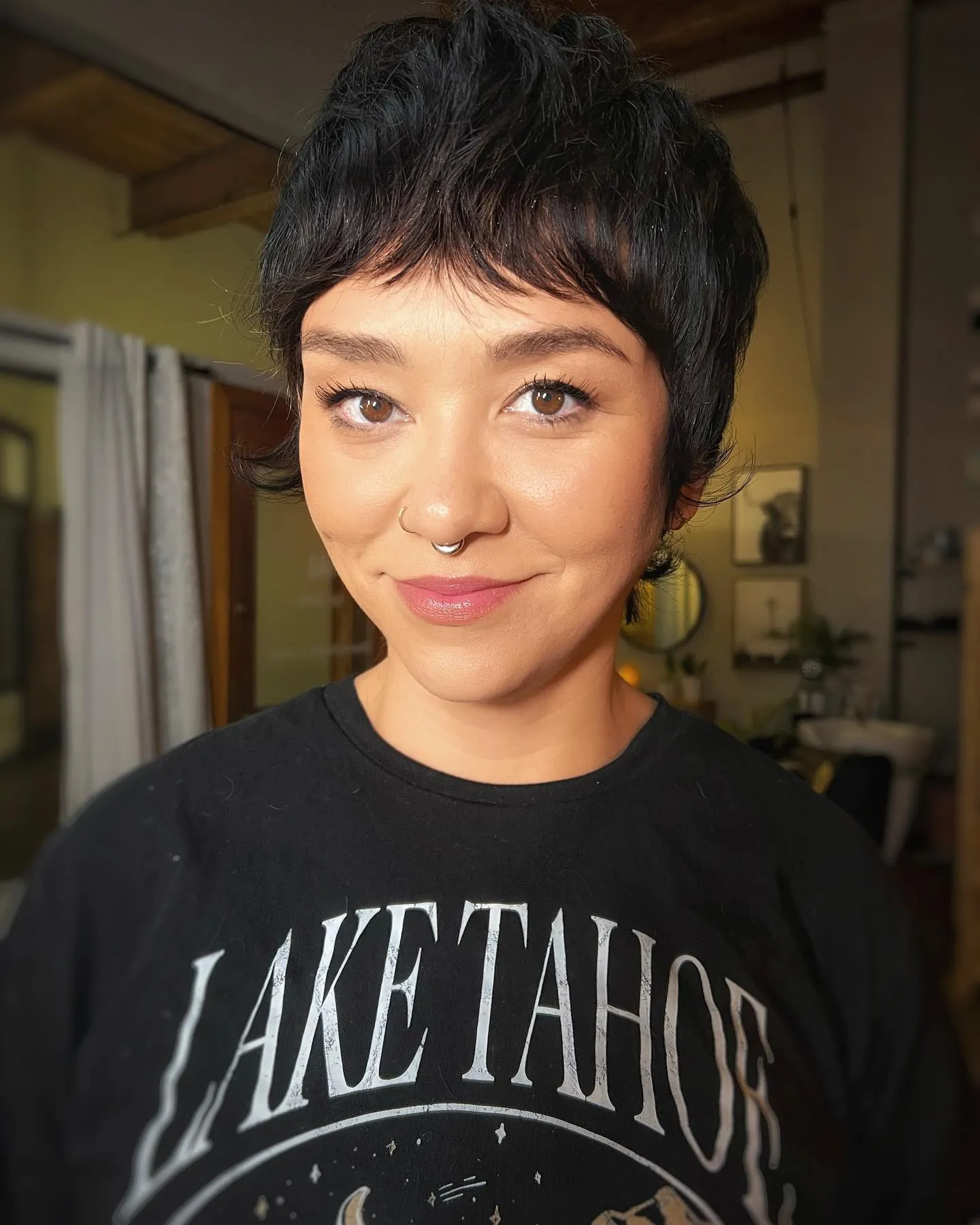 Textured dark pixie with short fringe and tousled crown