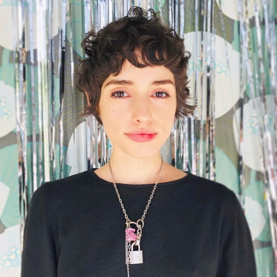 Curly shaggy pixie with short micro fringe