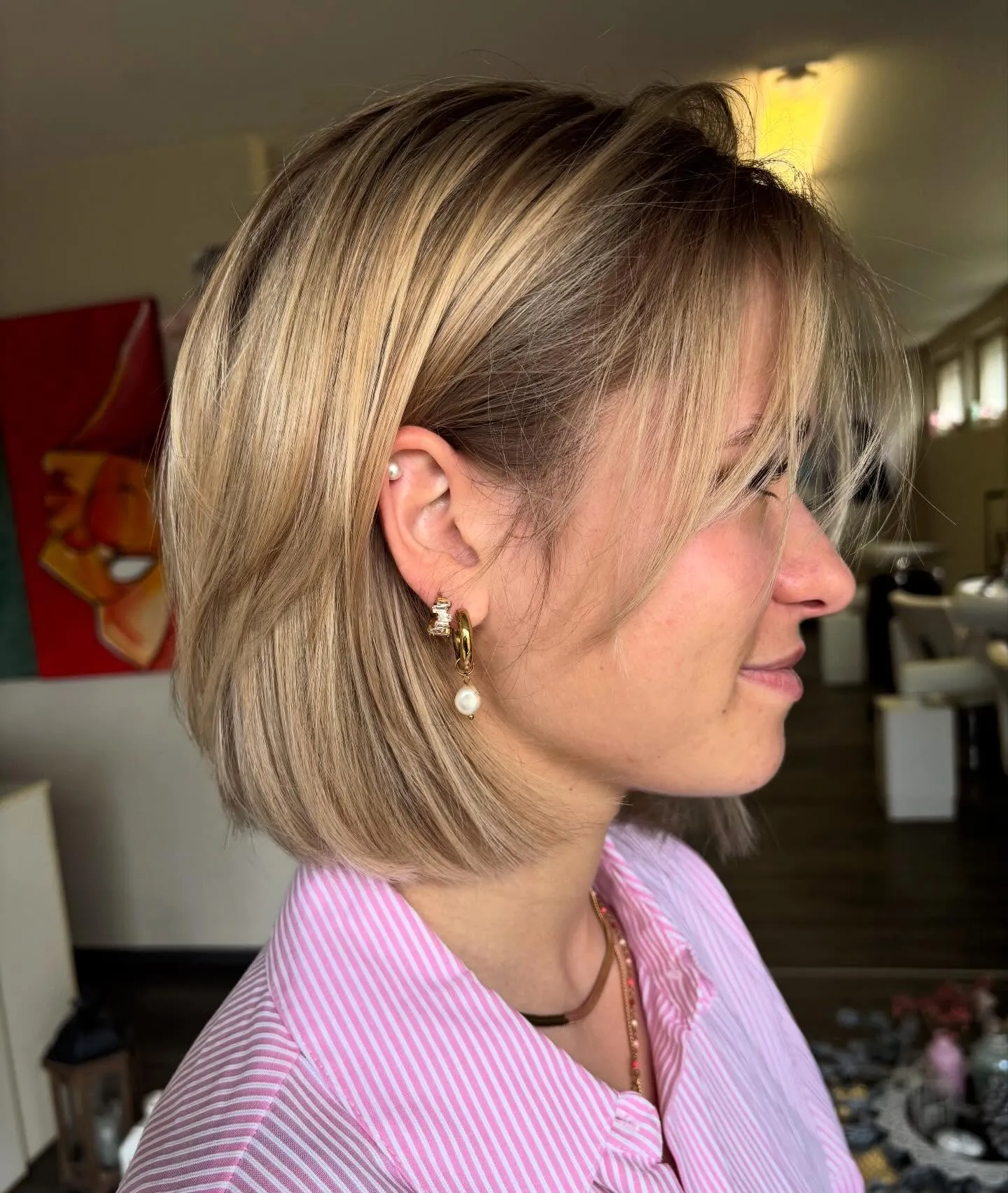 Tucked blonde bob with soft sweeping fringe