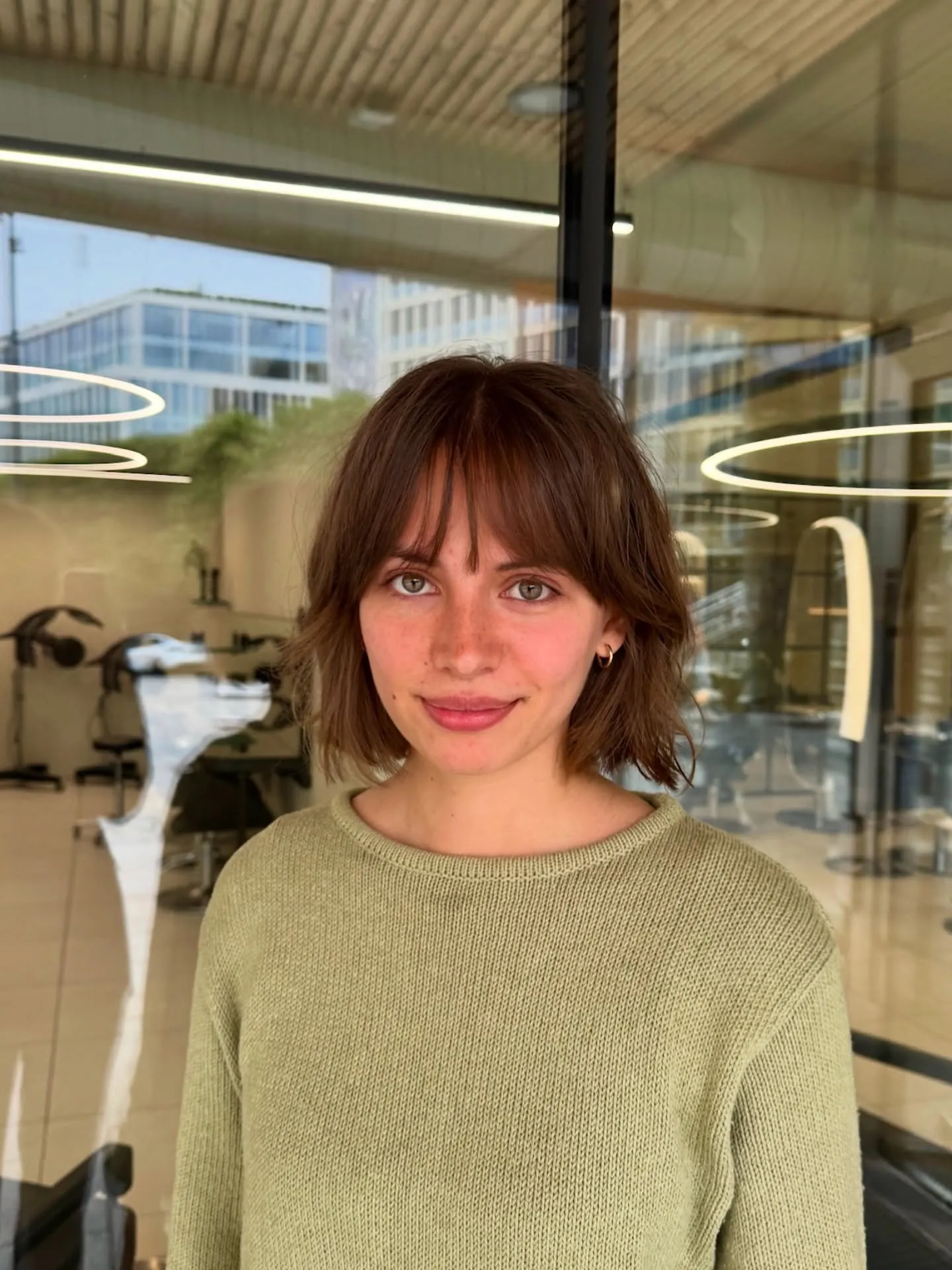 Wispy brunette bob with light curtain fringe