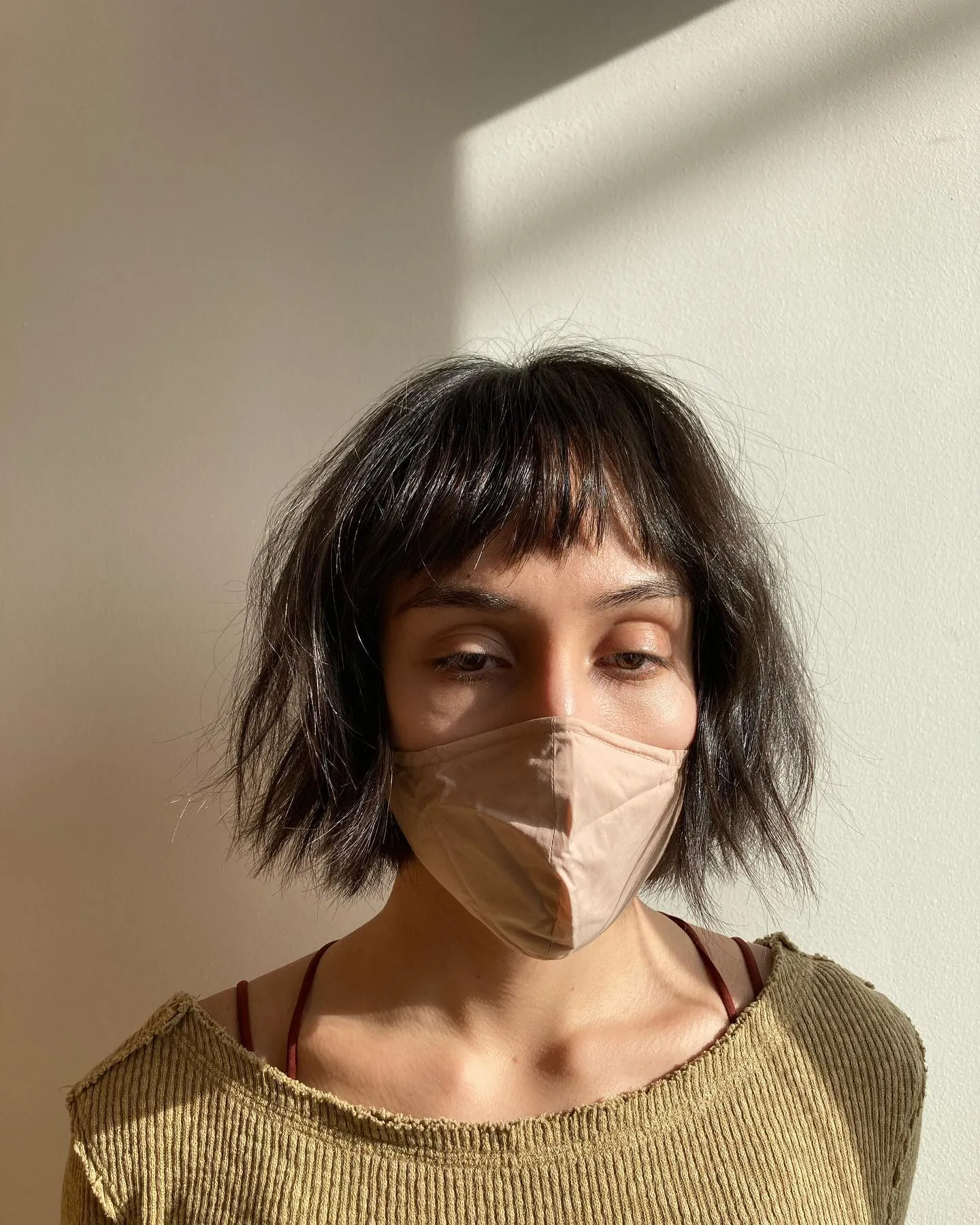 Textured short bob with fine uneven bangs