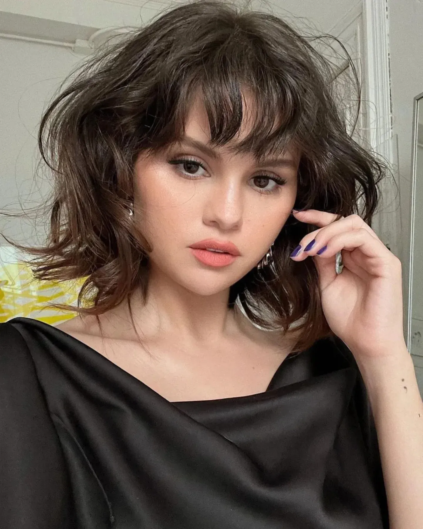 Wavy bixie with light wispy bangs