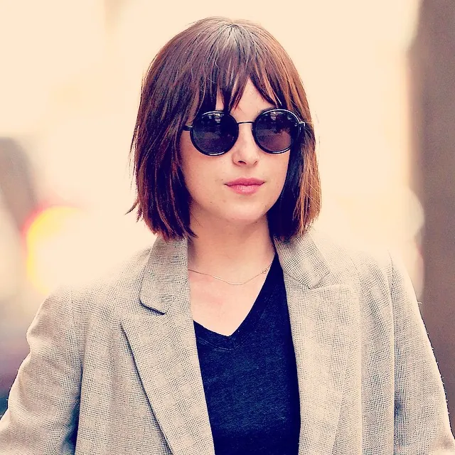 Sleek short bob with fine eyebrow-length bangs