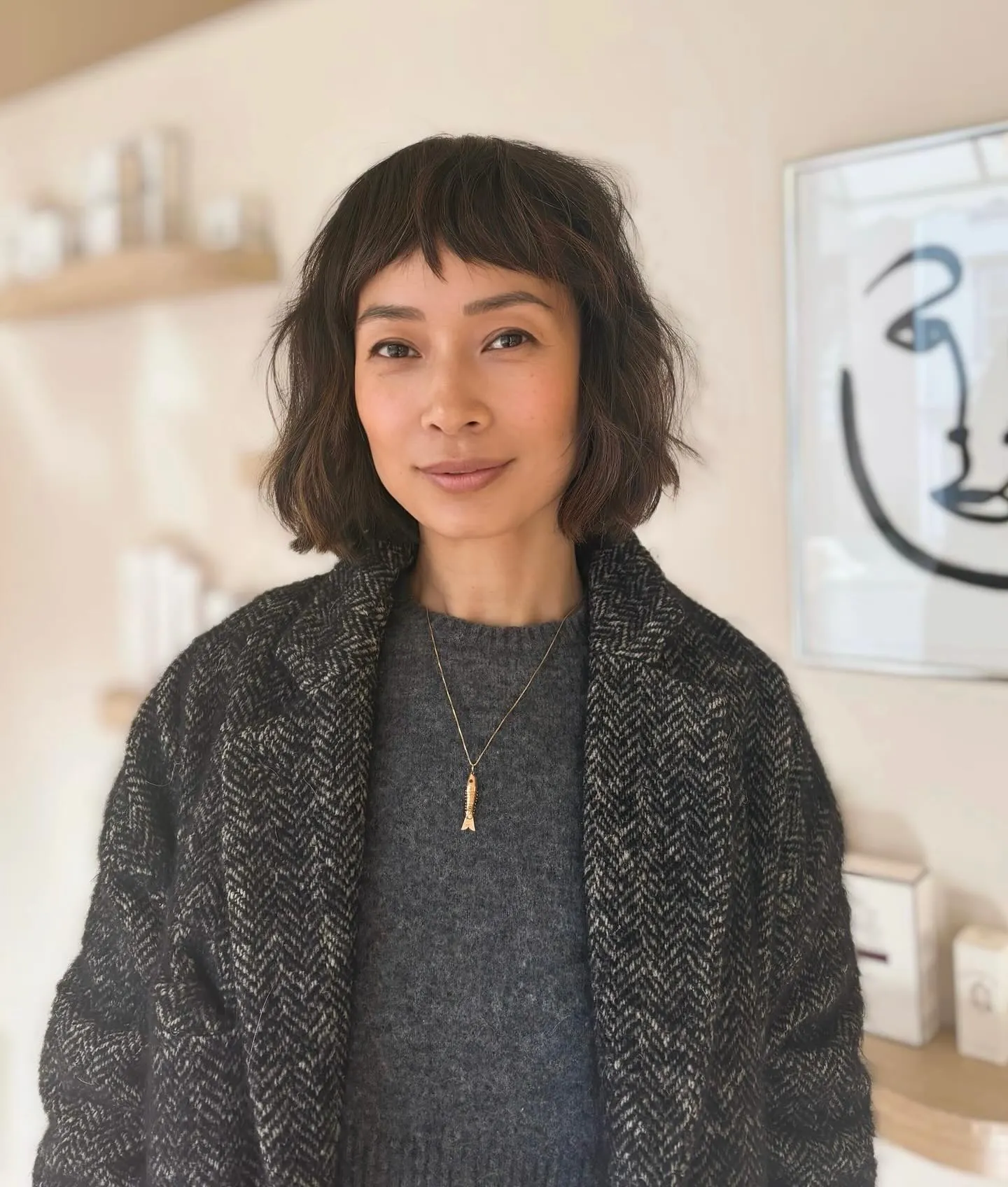 Tousled dark bob with short baby bangs