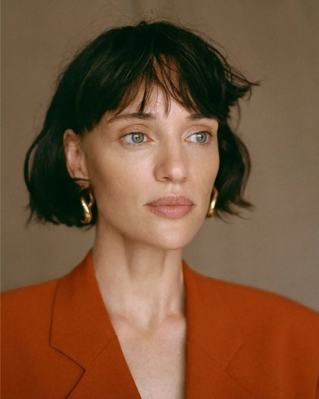 Short black bob with soft parted bangs