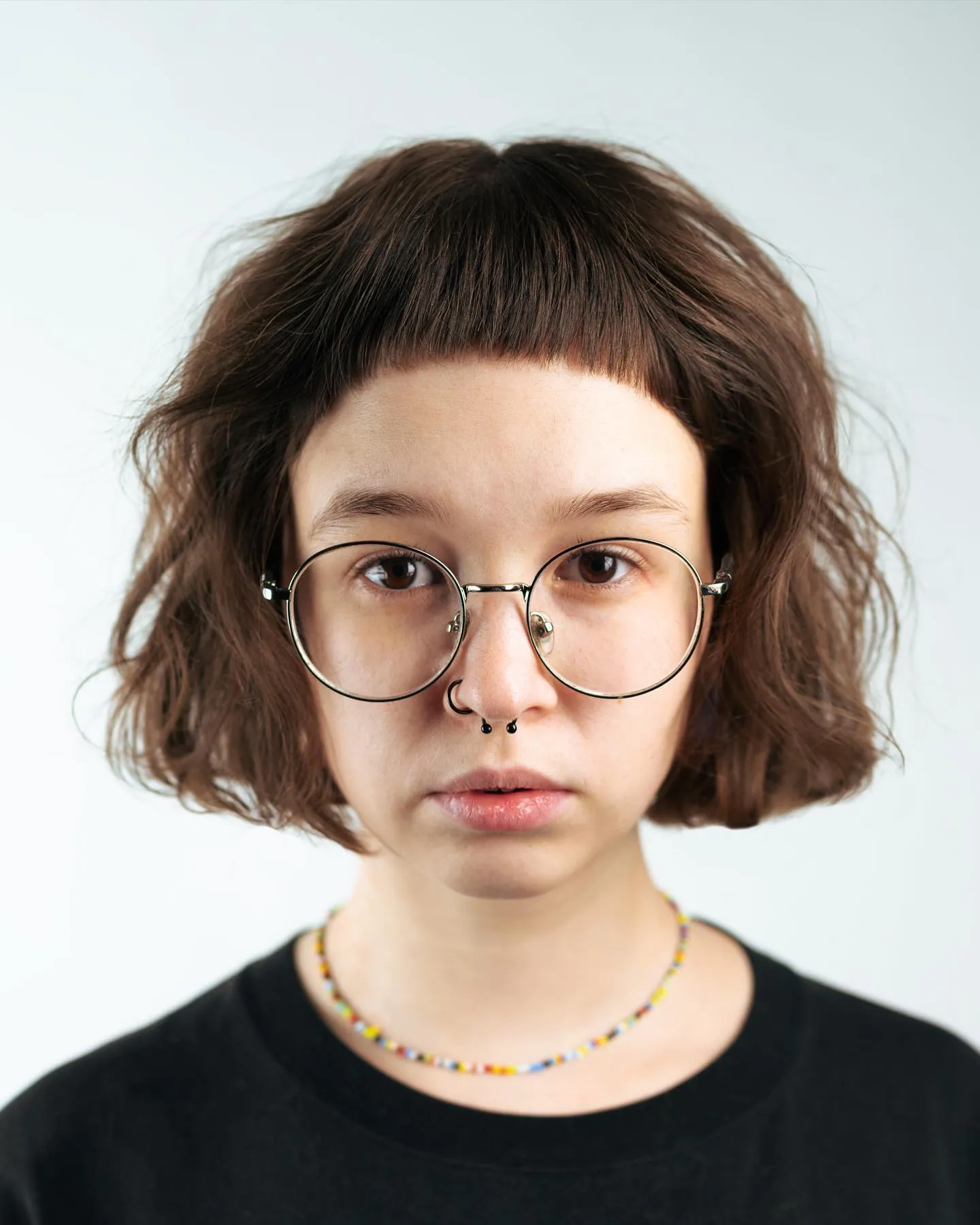 Wavy brown bob with short blunt micro bangs