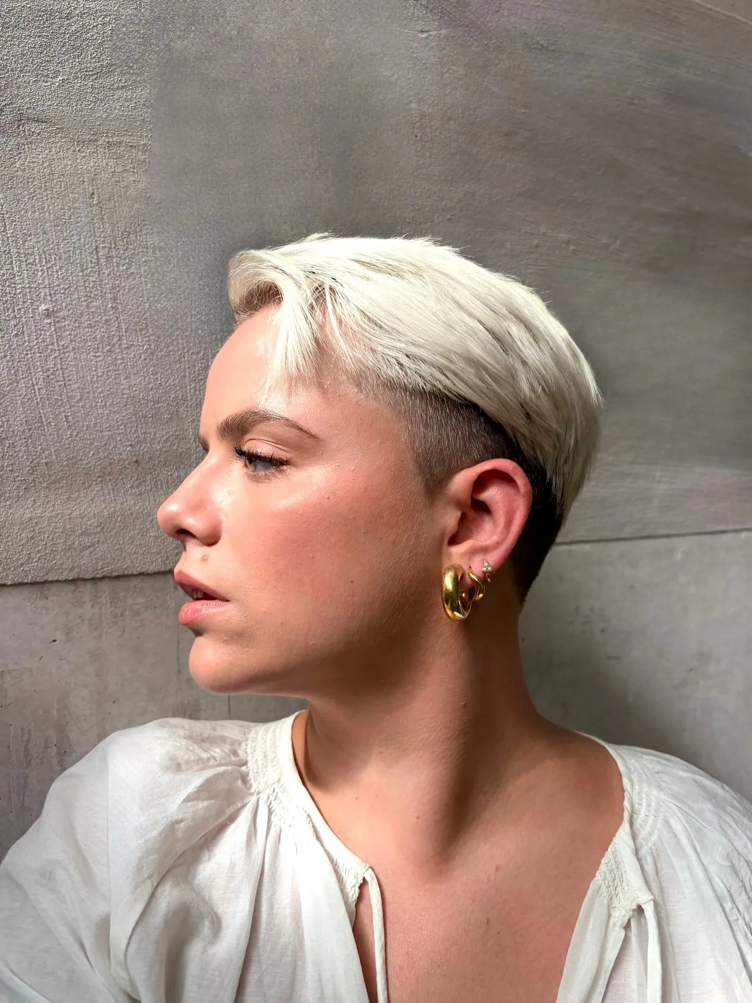 slicked undercut crop short hairstyle