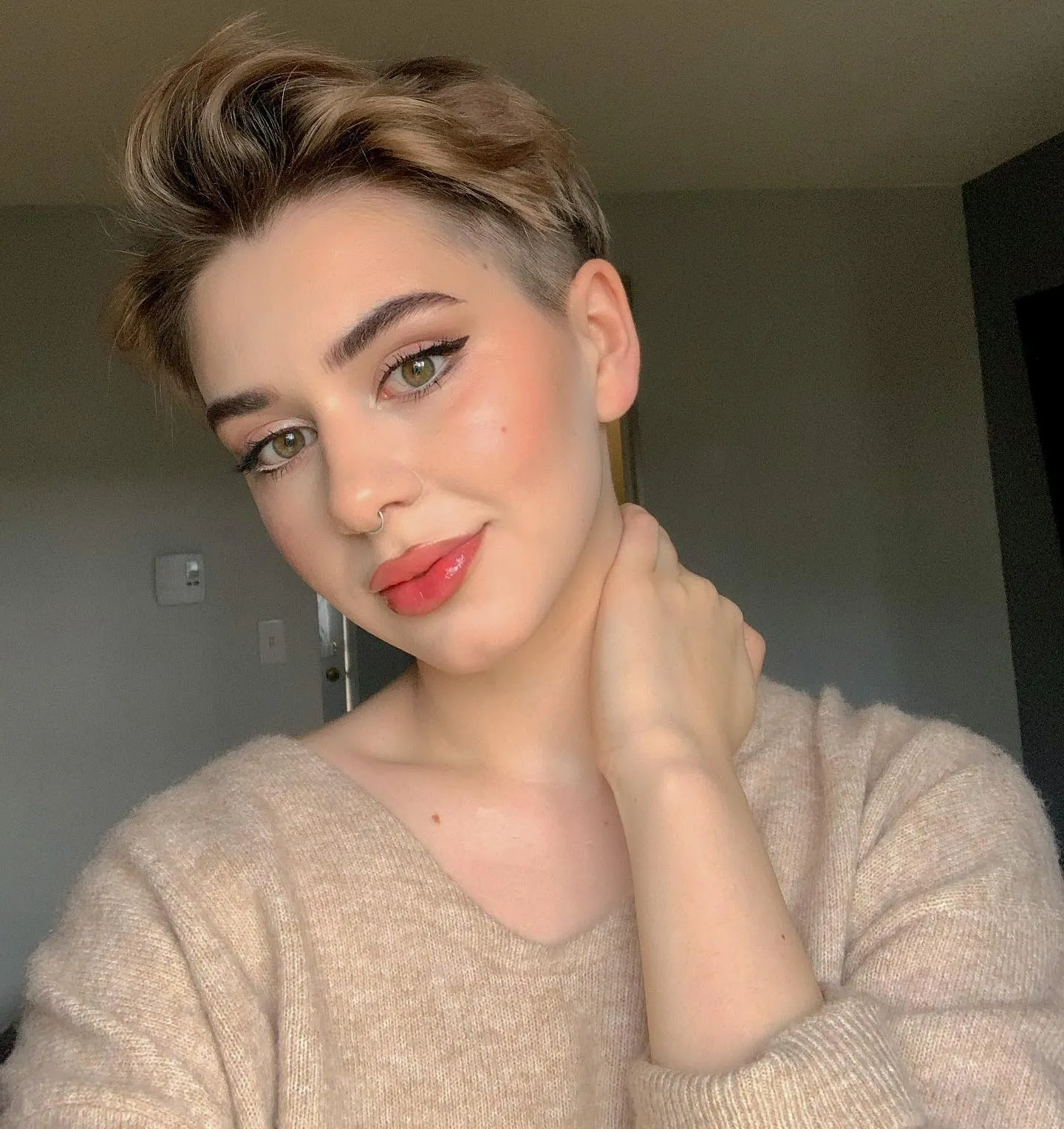 swept-back undercut short hairstyle