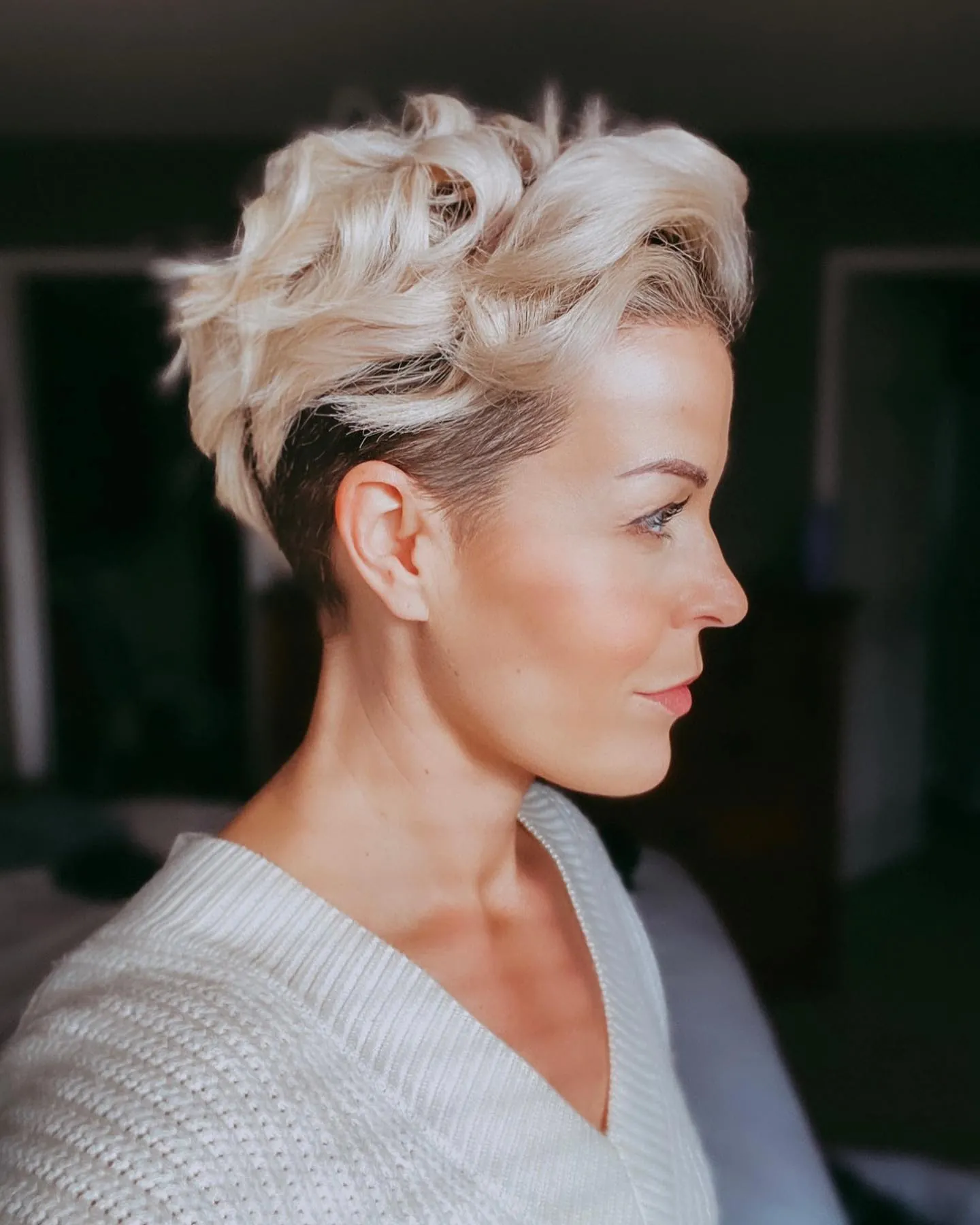 curly top undercut short hairstyle