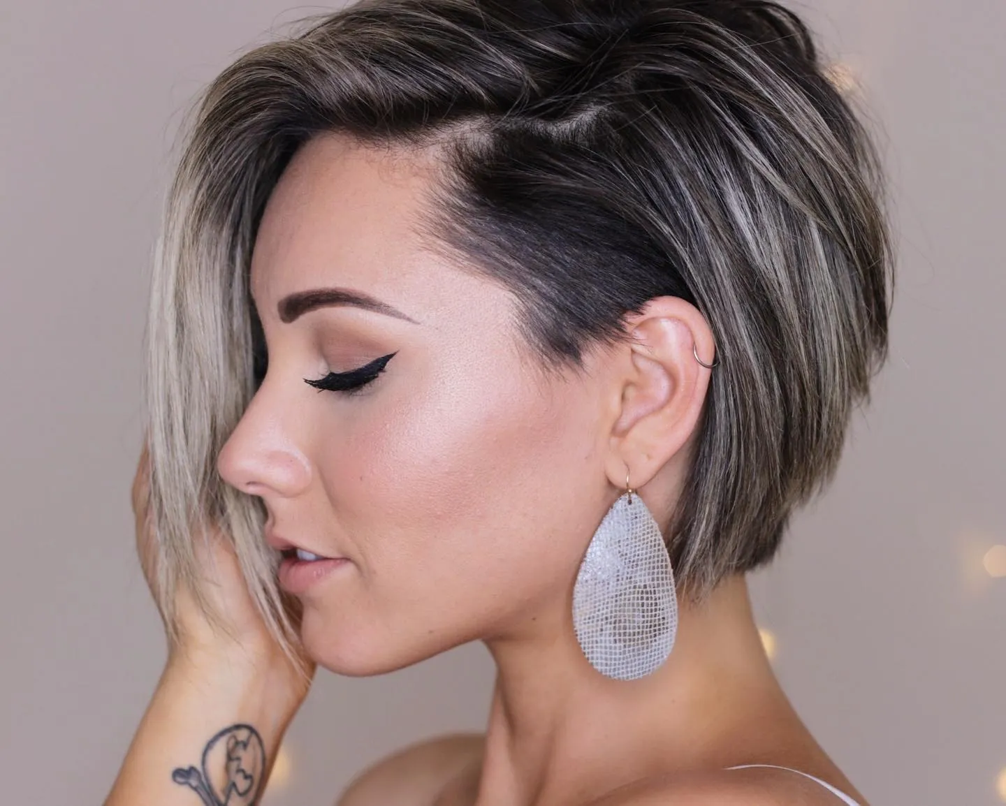 sleek side undercut short hairstyle
