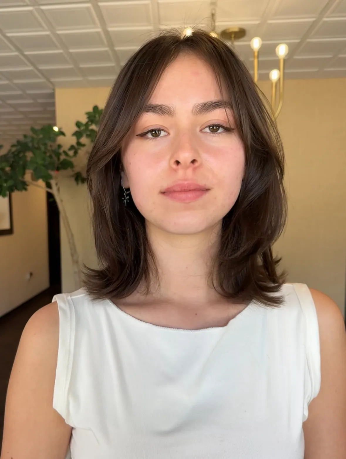 Center-part layered lob with softly flipped ends