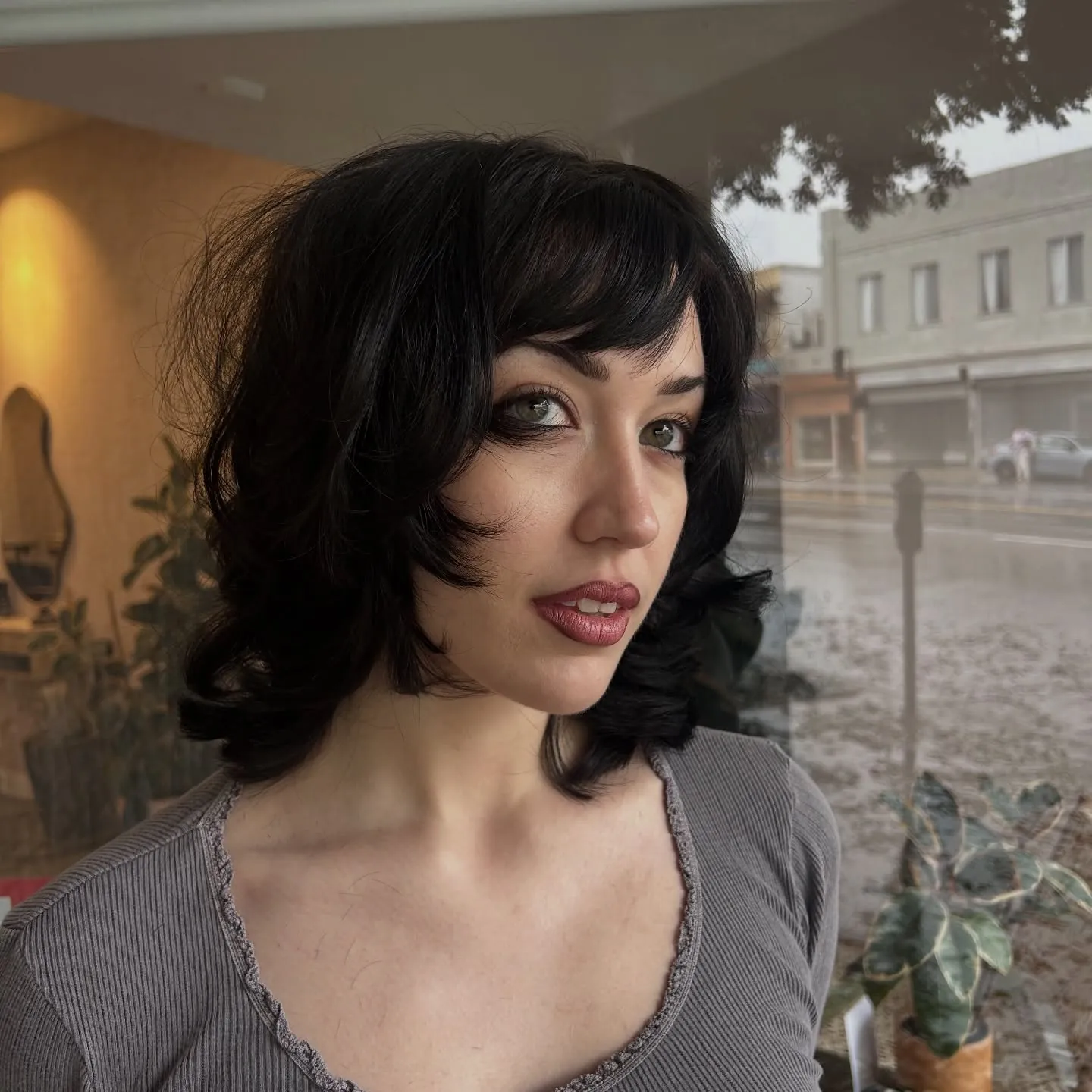Black short shag with fringe and curled side pieces