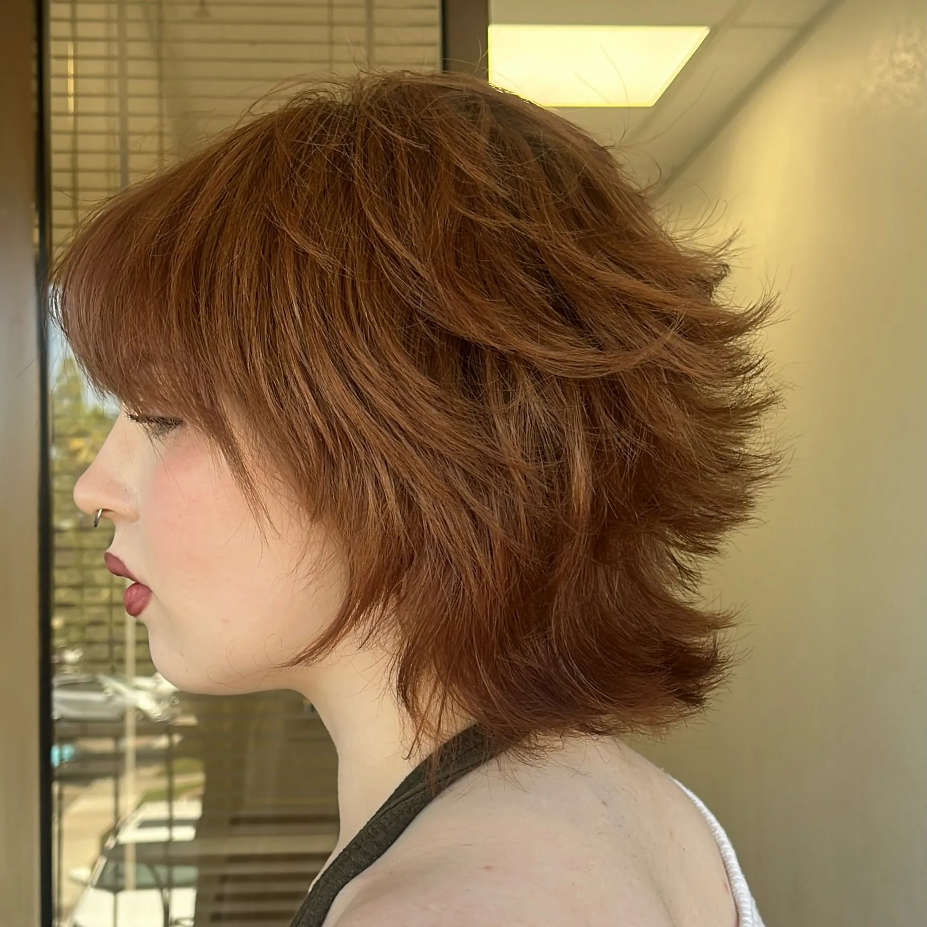 Copper short shag with choppy layers and wispy fringe