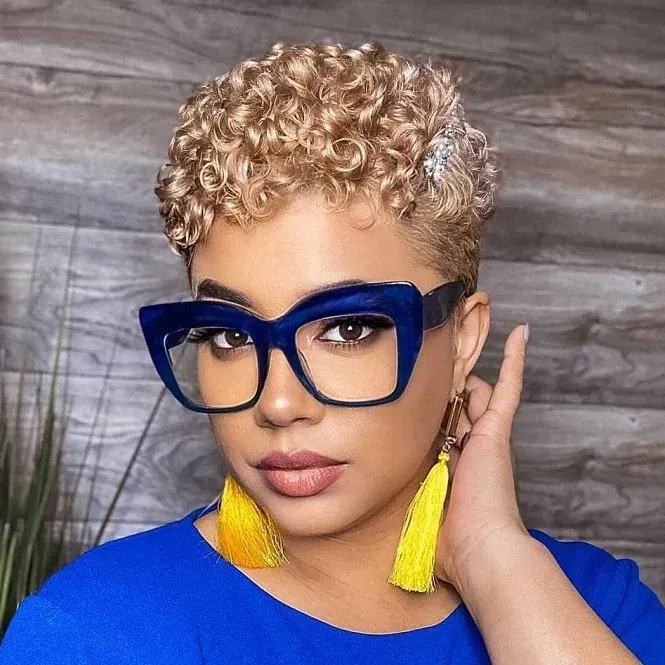 Close-cropped curls styled across the top
