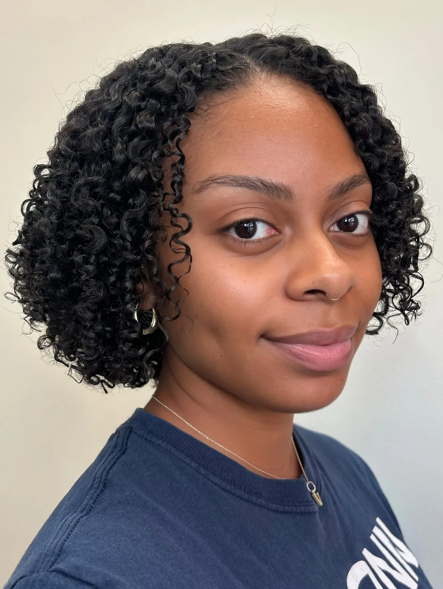 Center-part curl bob with defined natural curls
