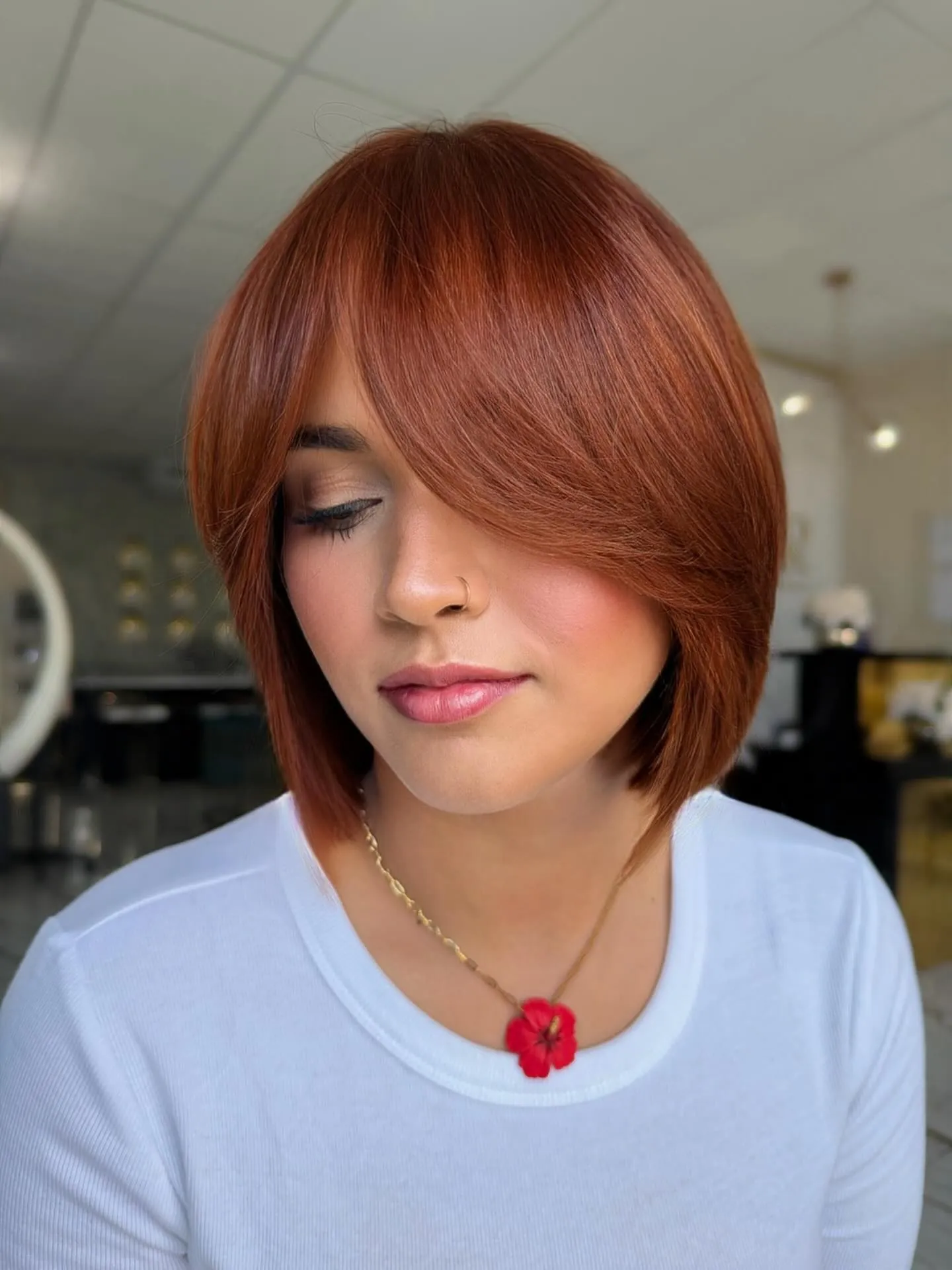 Sleek Side-Fringe Bob in short red hair