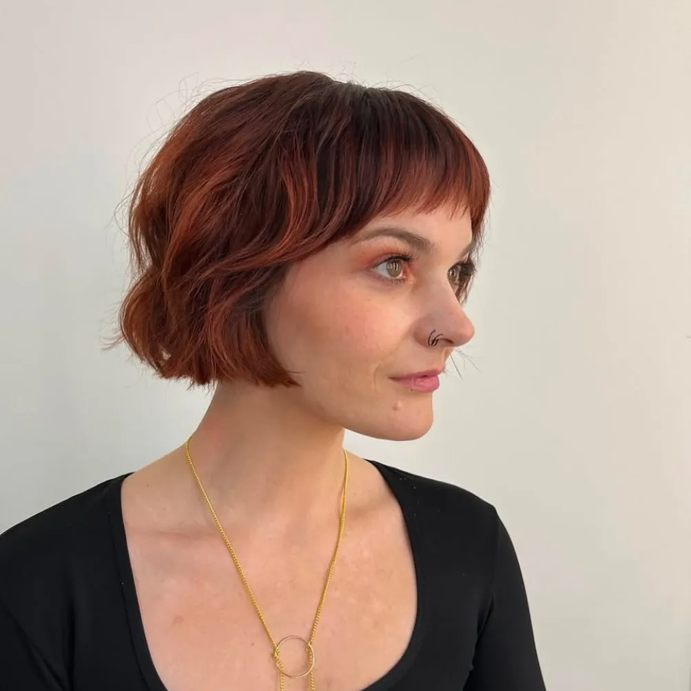 Auburn Baby-Bang Bob in short red hair