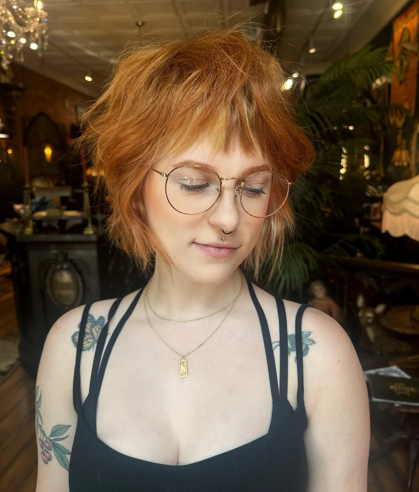 Choppy copper short shag with wispy bangs and layered ends