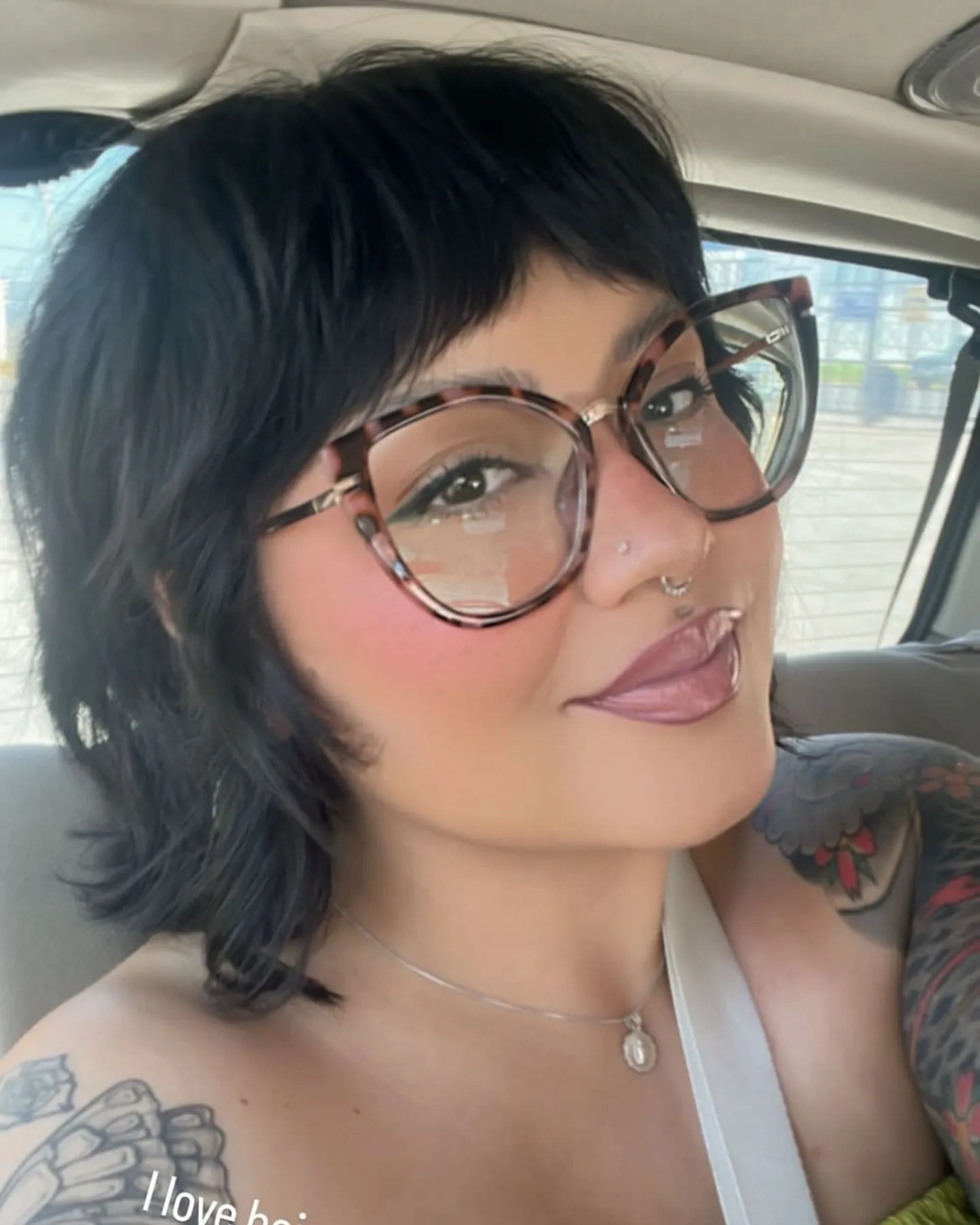 Black short shag bob with short bangs and flipped ends