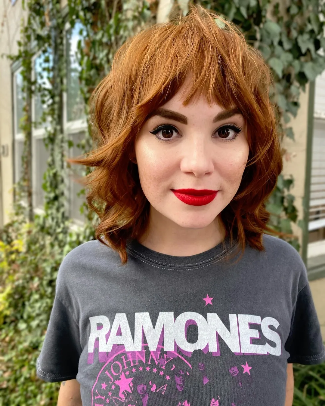 Piecey copper short shag with textured bangs and layered sides