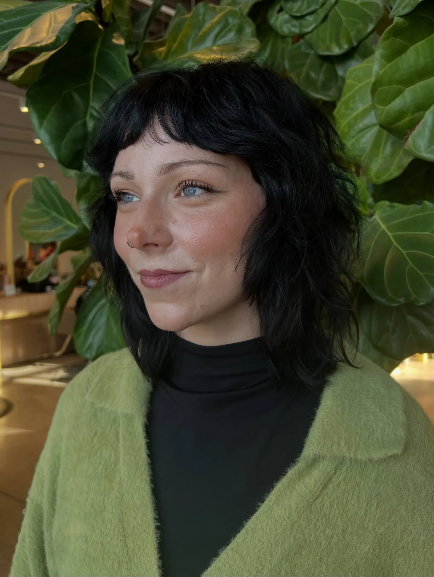 Dark short shag with micro fringe and tousled neck-length layers